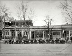Washington, D.C., circa 1915. "W.L. Smith agency, Argo cars, 14th Street N.W." Also home, as seen here earlier, to the Square Deal Auto Exchange. National Photo Company Collection glass negative. View full size.
Geyer&#039;s Beer Garden


Washington Post, Oct 7, 1909.

Geyer's Palm Garden.


F.H. Geyer has done much for upper Fourteenth street in the way of palm garden amusements for summer evenings. He purchased the place from George F. Kozel, and remodeled it, making it the best equipped in this vicinity. His winter palm garden, which has just opened, is one of the fashionable resorts of the northwest. The catering is excellent, seafood a speciality, and good music is always an attraction.




Washington Post, Oct 22, 1933.

Beer Gardens of Old Capital Added Froth to Life.

&hellip; 

On Upper Fourteenth street, just below U, was the dandy of all beer gardens &mdash; Geyer's. Out in the back yard, covered with gravel that persistently got in low shoes, a band blared away while waiters rushed to and from with seidels, steins, and schooners. Geyer's was the Mecca for young love; for the young blades of the day. It was packed and jammed nightly.

Gentlemen!An early SCCA or IMSA gathering.  The stretch of 14th (and 15th) out from Massachusetts Avenue seemed to attract auto sales emporiums.  I remember them from when at SJC on Vermont Avenue back before time was invented.
Almost 100 years laterView Larger Map
As Seen on ShorpyMore on the Argo Cyclecar here and here.


A Quick GetawayLooks like the starting lineup of the Annual Al Capone 500.
Holy Cow - another dairy sign!I guess I've led a sheltered life or something.  Seeing "Dairy Lunch" signs in at least a couple Shorpy photos and wasn't sure what it meant -- milkshakes?  I did a little Internet searching and I see its use being Jewish to separate meat from dairy, more like fish, eggs and dairy products.  It is also the part of many restaurant names.  Anyone know more about this interesting term?
[More on the "dairy lunch" phenomenon here. - Dave]
Thanks Dave.  In addition to the extra Dairy Lunch info you've provided, I also just discovered that I can add another comment below yours ... well, at least I hope so.  I will find out if this comment shows up.  Love this website!
(The Gallery, Cars, Trucks, Buses, D.C., Natl Photo)