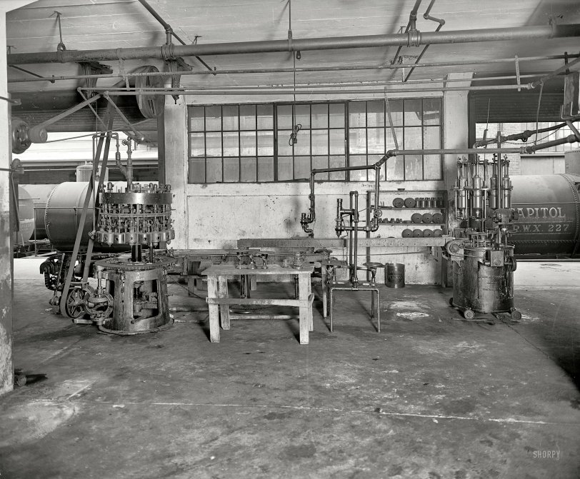 Circa 1925. "Whistle Bottling Works." A peek behind the scenes at the Washington, D.C., bottling plant for Whistle orange soda. View full size.
