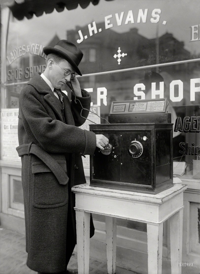 Washington circa 1922. "Coin-operated radio outside barbershop." Now's your chance to hear what all the fuss is about. Harris &amp; Ewing photo. View full size.
