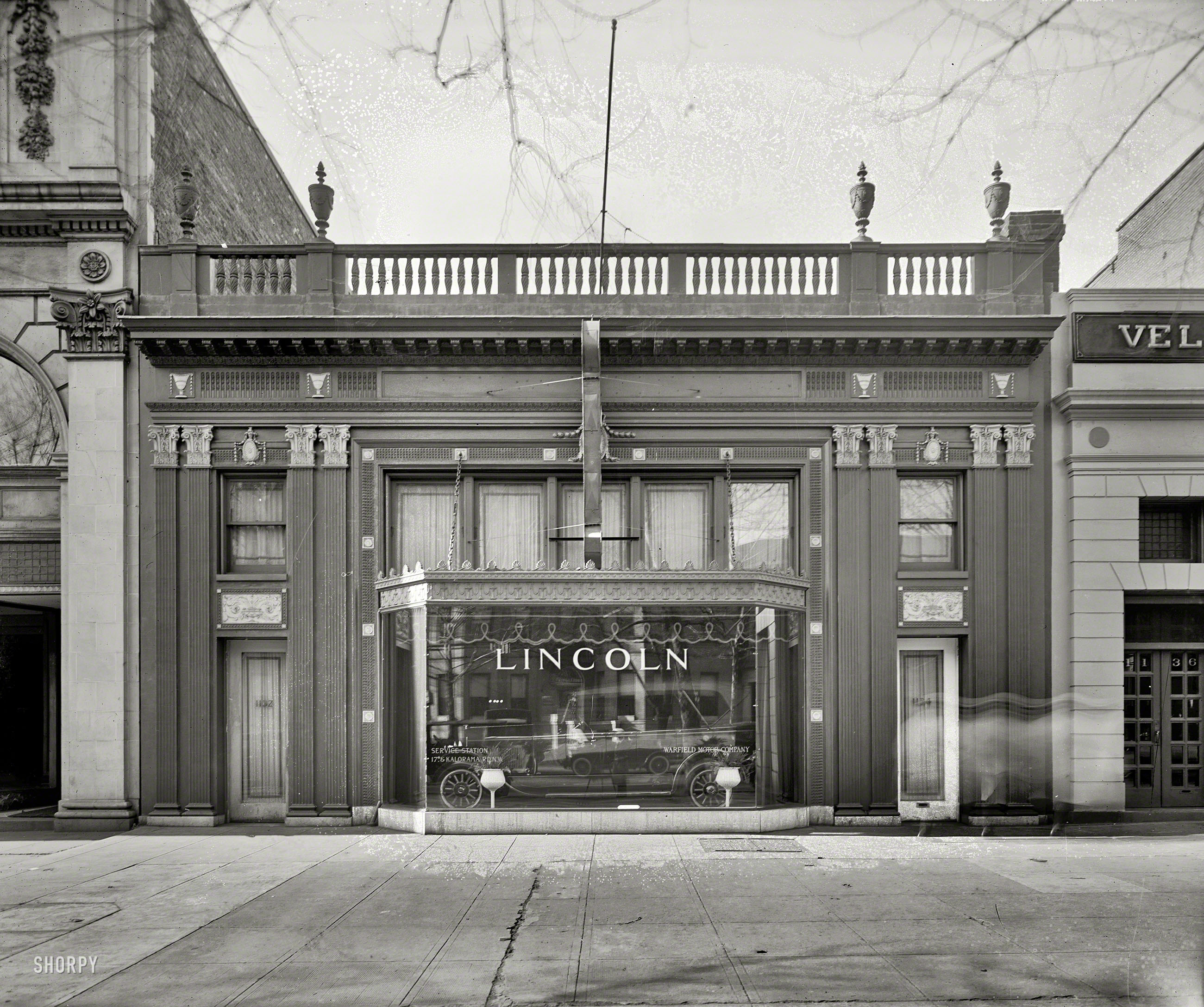 Washington, D.C., circa 1925. "Exterior, Warfield Motor Co." The Lincoln dealer whose service garage we recently saw here. In 1927 the company moved next door into the building on the left. National Photo Co. View full size.
