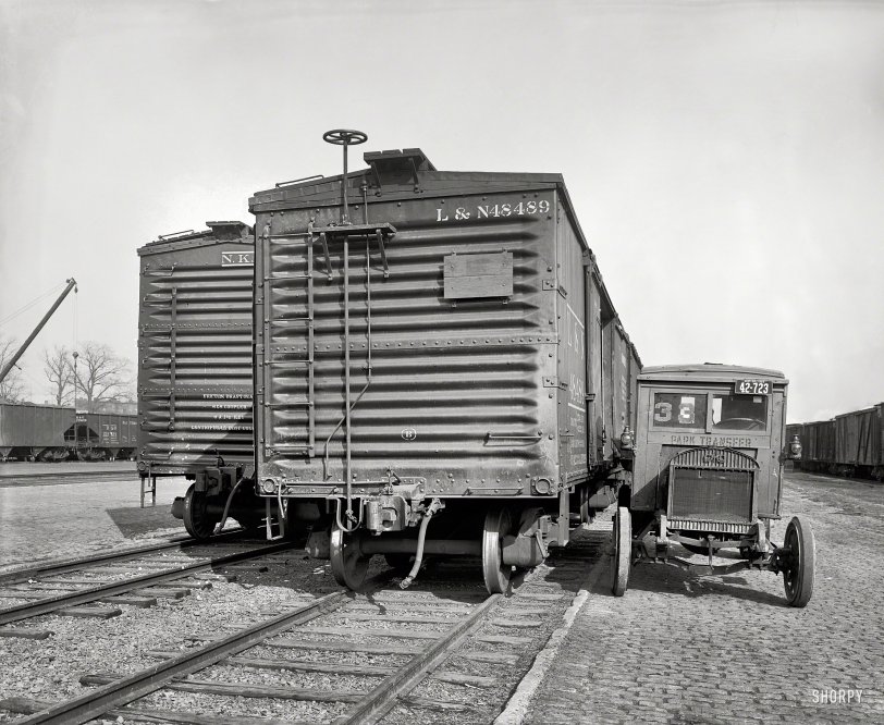 Washington, D.C., 1925. Something for the railfans, something for the truckfans. "O.D. Boyle" is all it says here. National Photo glass negative. View full size.
