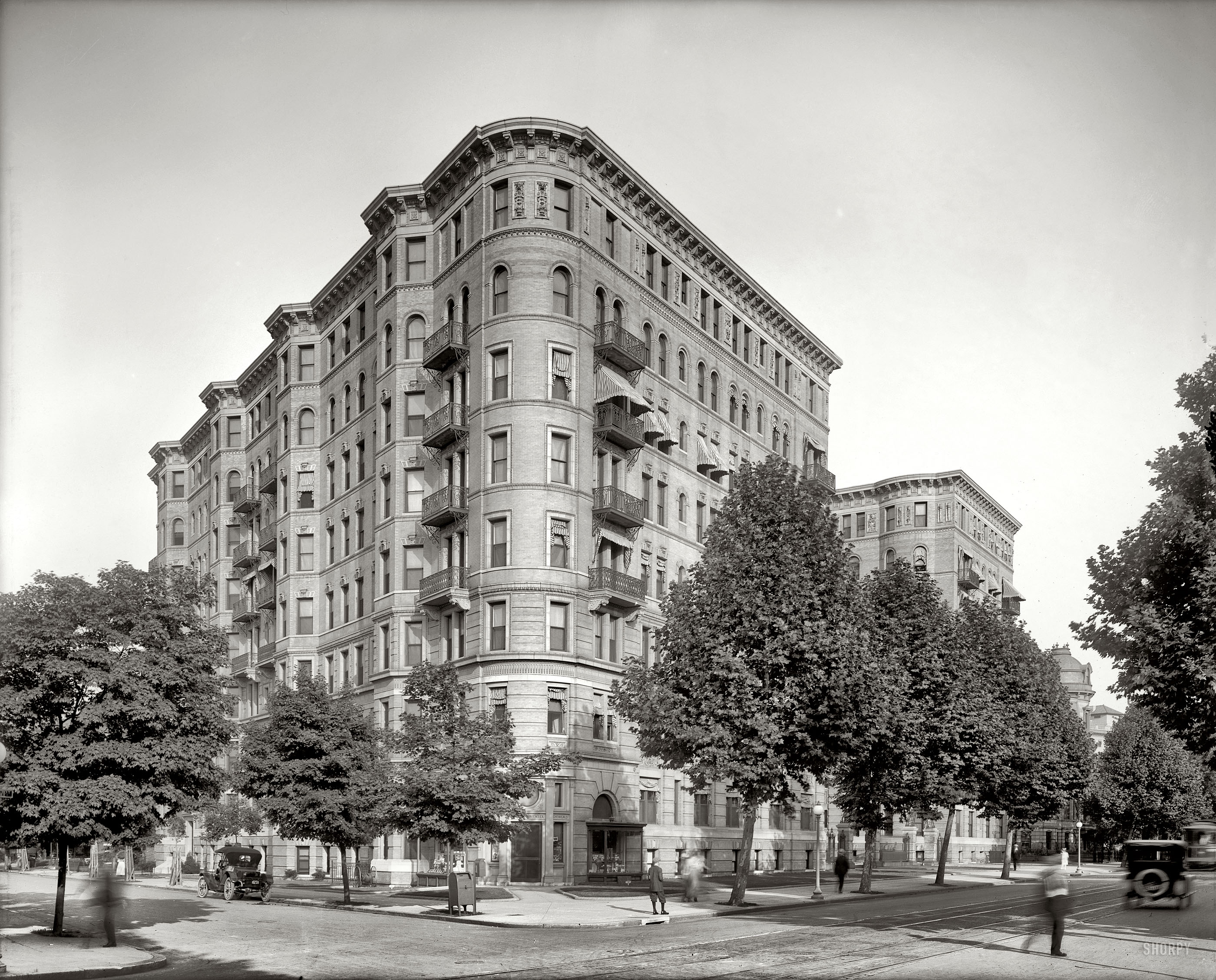 Washington, D.C., circa 1925. "Stoneleigh Court." Passers-by, frozen in time. National Photo Company Collection glass negative. View full size.