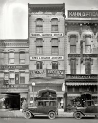 Washington, D.C., circa 1925. "Federal Clothing Store, 621 Seventh Street N.W." National Photo Company Collection glass negative. View full size.
What&#039;s the white stuff?On the car wheels, sidewalk, and up the outside of the building.
[Mold that's grown on the negative. -tterrace]
(The Gallery, Cars, Trucks, Buses, D.C., Stores & Markets)