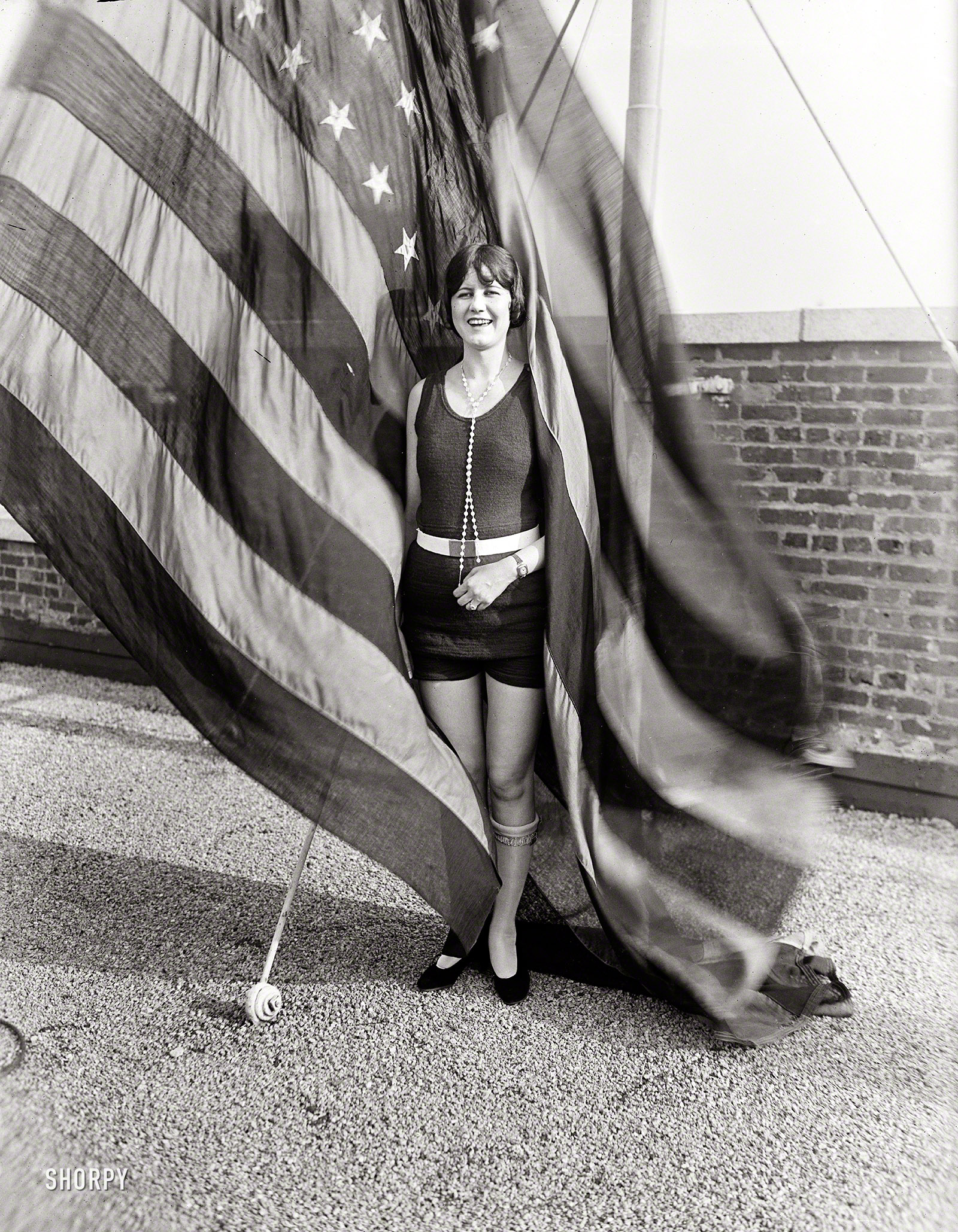 From 1924 comes our patriotic girl with the pearls in a Harris & Ewing plate labeled NO CAPTION. Happy Independence Day from Shorpy! View full size.