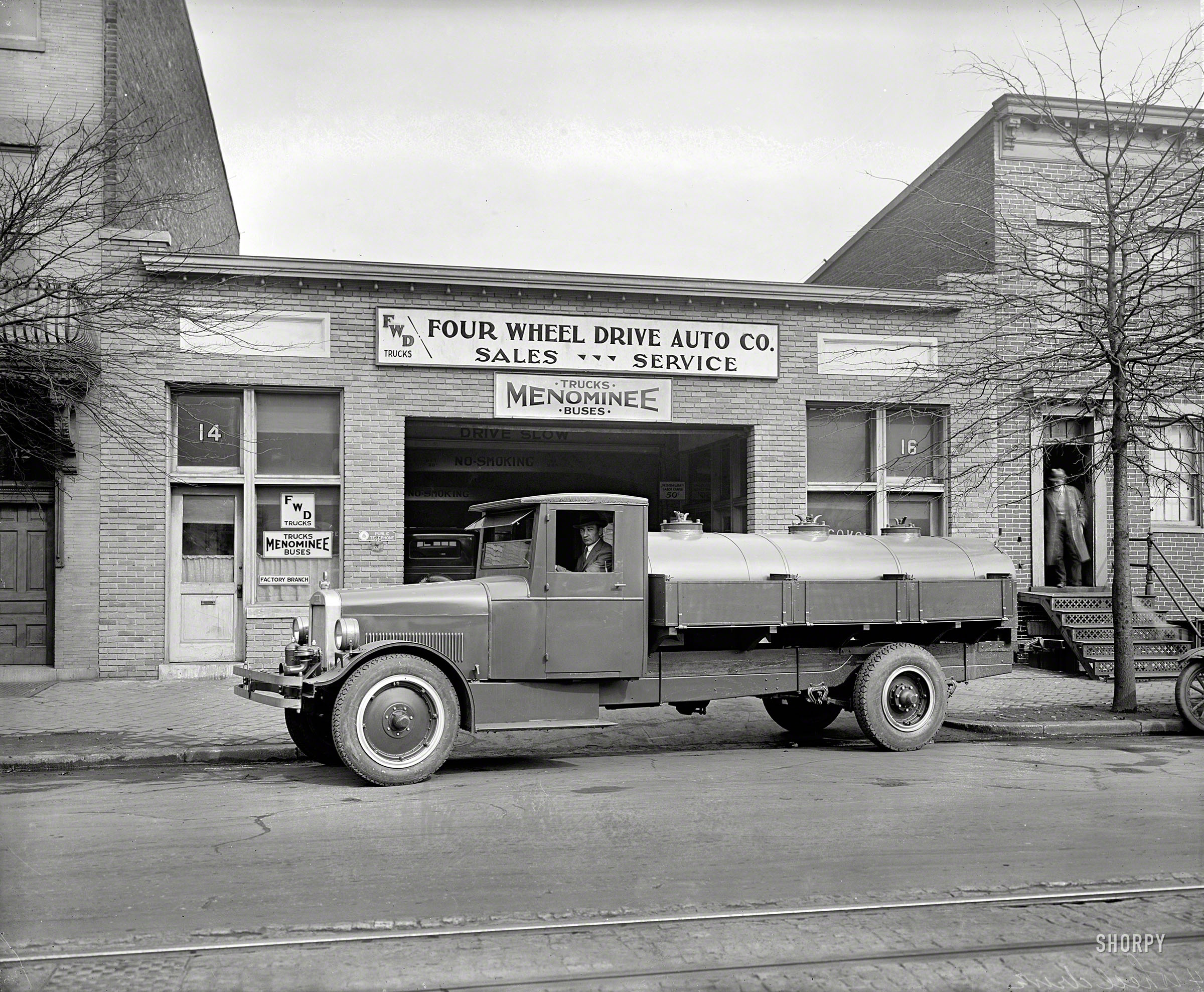 1926. Washington, D.C. "Four Wheel Drive Auto Co. oil truck, H Street N.E." My favorite detail here: "Minimum Labor Charge 50¢." View full size.
