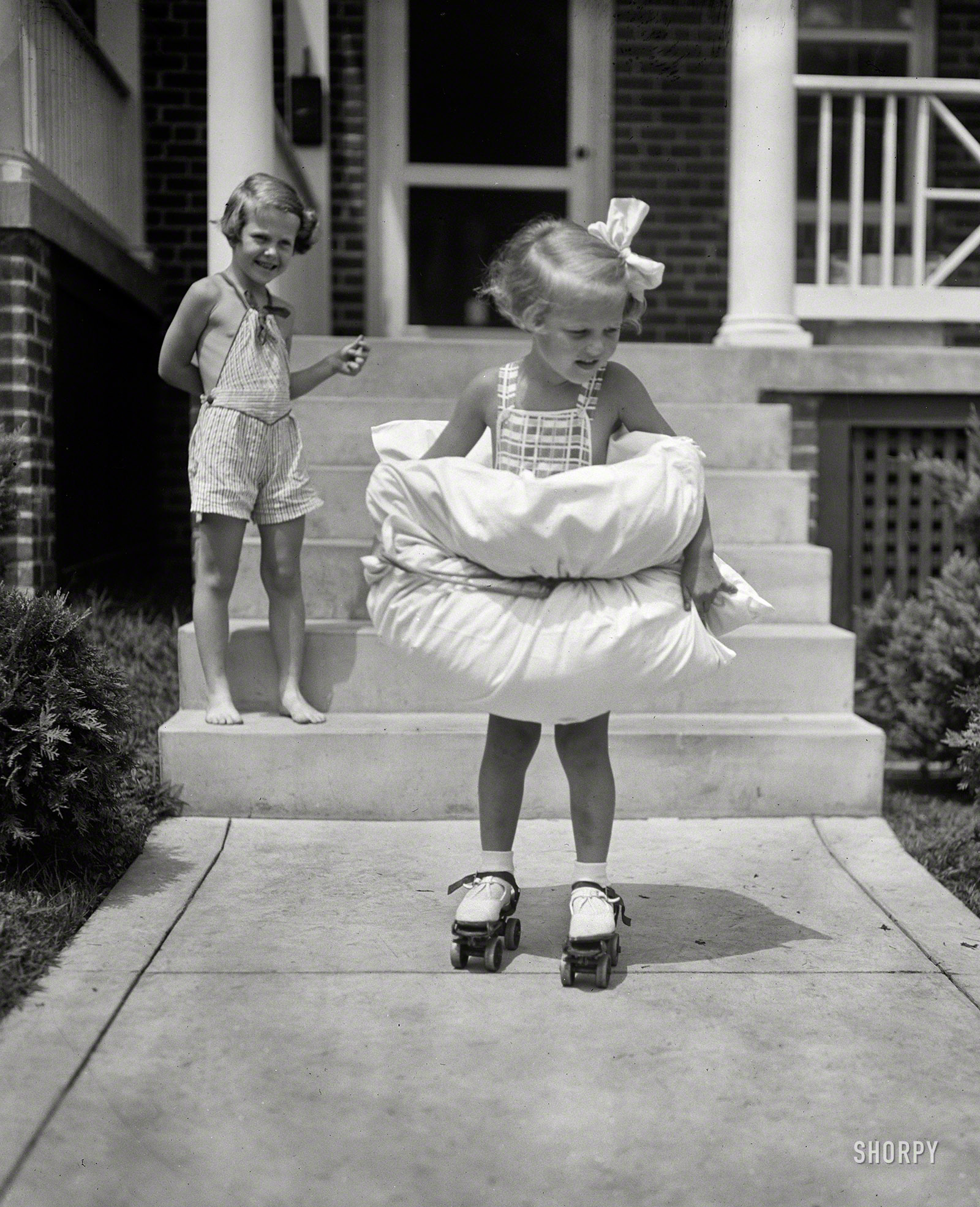 Aug. 8, 1936. Washington, D.C. "Safety first for this Miss. Equipped with bumpers fore and aft, 4-year-old Betty Buck is taking no unnecessary chances as she tries her first pair of roller skates." Harris & Ewing glass negative. View full size.
