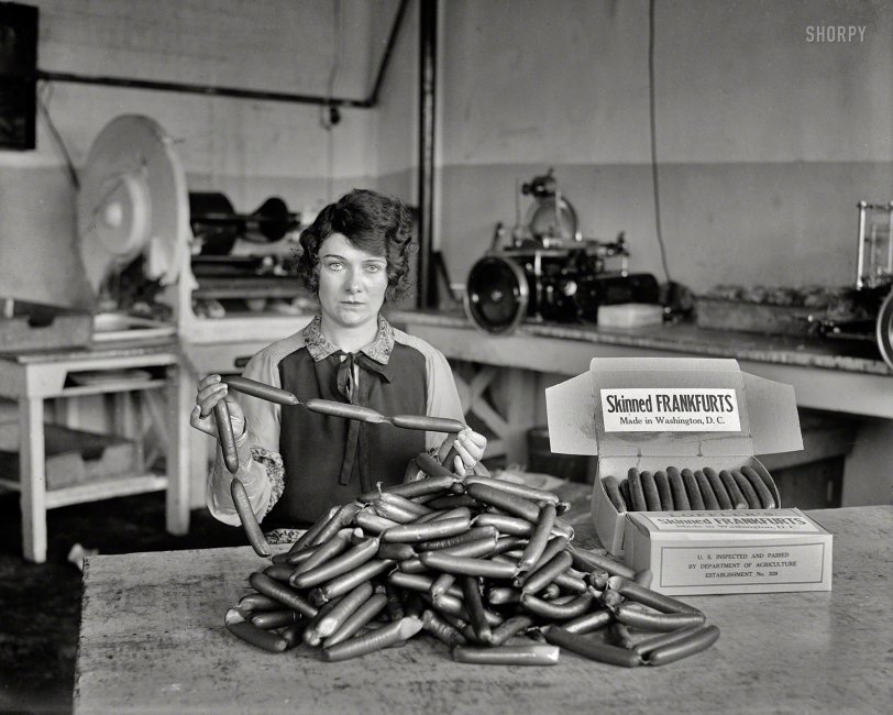 1927. "Skinned frankfurts, made in Washington, D.C." What Bismarck said about laws and sausages: It turns out you can watch them (or not watch them) being made in the same place. Harris &amp; Ewing glass negative. View full size.
