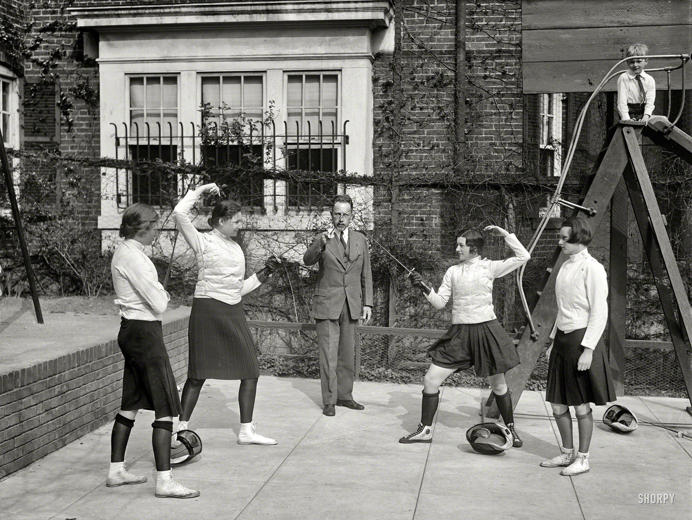 April 16, 1930. "These Washington society girls will compete for fencing title of the District of Columbia at the Mayflower Hotel this week. Left to right: Elizabeth Bunting, judge; Priscilla Holcombe; Maj. Walter E. Blunt, referee; Margaret Montgomery; and Lillian Shuman, judge." Harris & Ewing. View full size.