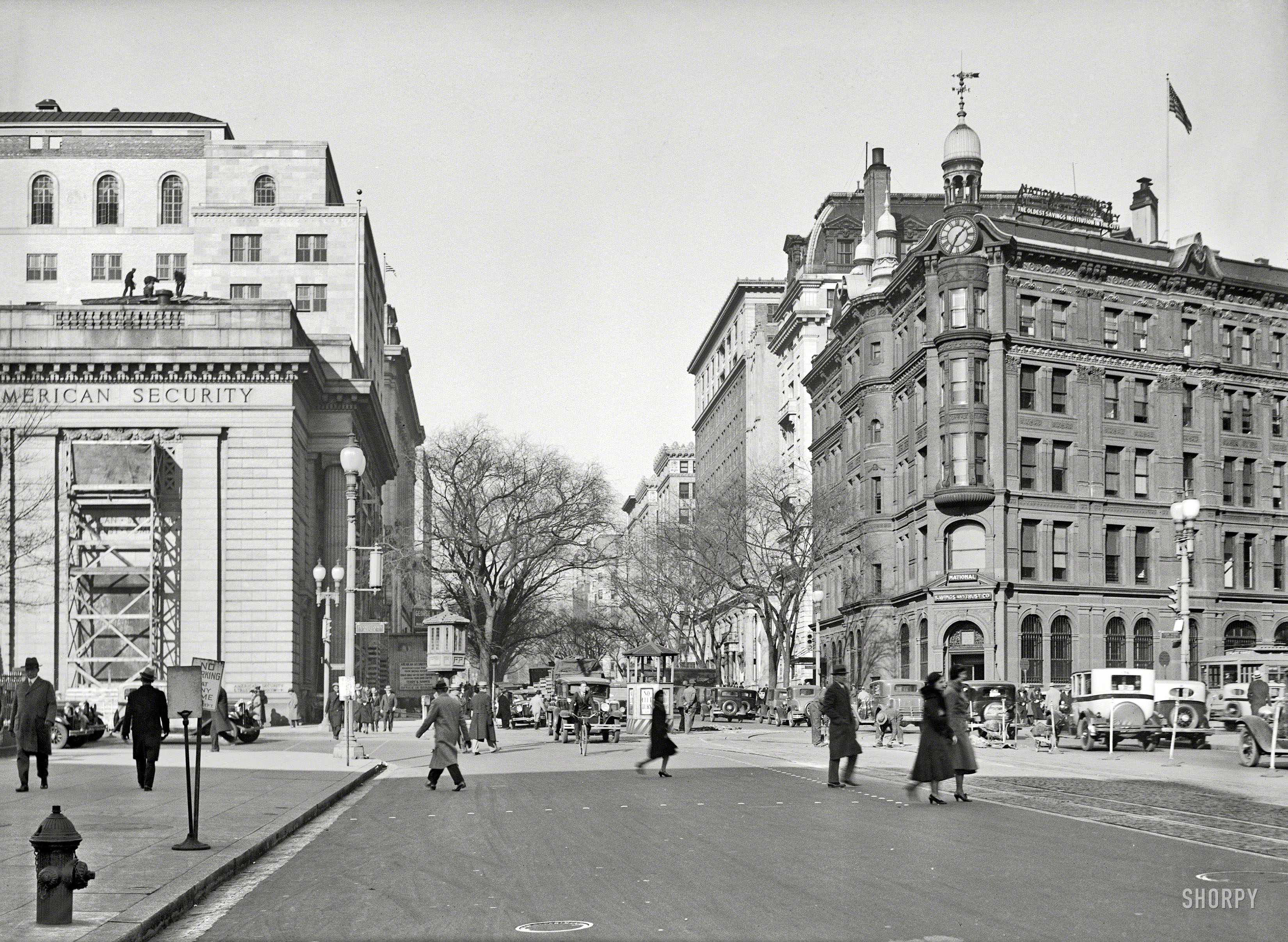 Washington, D.C., circa 1931. "Fifteenth Street at Pennsylvania Avenue." Note the traffic lights, which made their D.C. debut in 1926, as well as the traffic-cop gazebo at center ("NO LEFT TURN") and streetcar switch tower to its left. Harris & Ewing Collection glass negative. View full size.