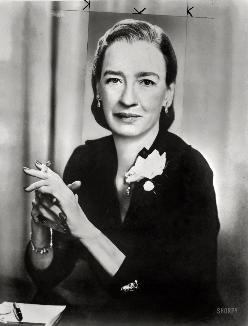 "Dr. Grace Hopper, director, Systems Research, Remington Rand, half-length portrait, seated, smoking cigarette." The pioneering computer programmer and Navy admiral (1906-1992) is the subject of today's Google Doodle, marking her 107th birthday. New York World-Telegram &amp; Sun Collection. View full size.

