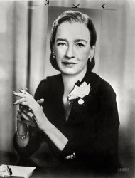 "Dr. Grace Hopper, director, Systems Research, Remington Rand, half-length portrait, seated, smoking cigarette." The pioneering computer programmer and Navy admiral (1906-1992) is the subject of today's Google Doodle, marking her 107th birthday. New York World-Telegram & Sun Collection. View full size.