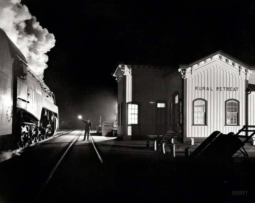 1957. "The Birmingham Special gets the highball at Rural Retreat, Virginia." Gelatin silver print by O. Winston Link. View full size.
