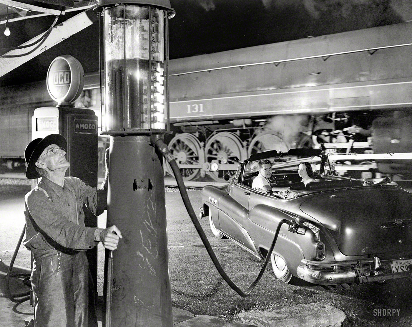 Vesuvius, Virginia, 1956. "Sometimes the electricity fails." Gelatin silver print by Ogle Winston Link, pioneer of the photographic genre that might be called rail noir. Library of Congress Prints & Photographs Division. View full size.