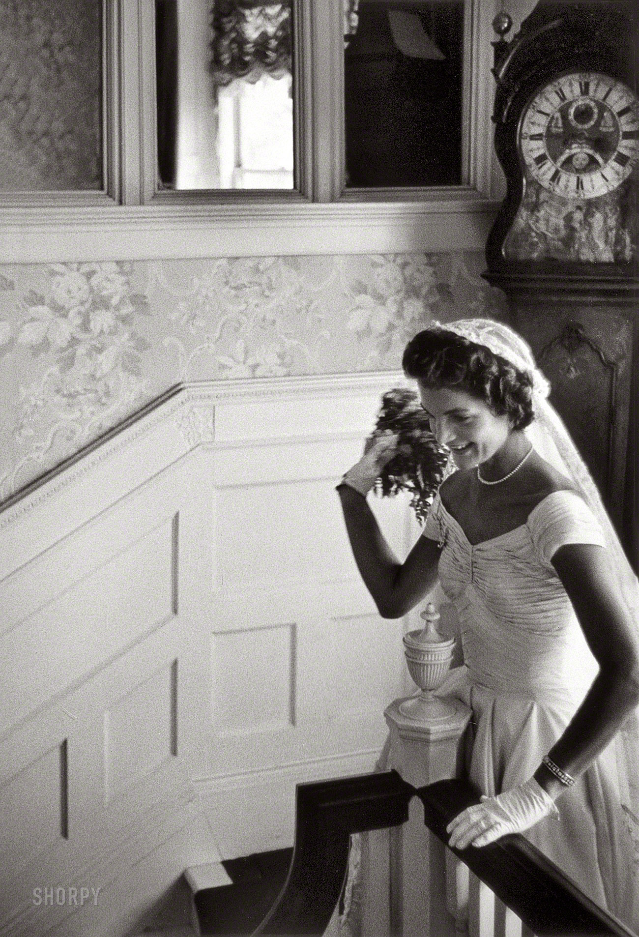 Sept. 12, 1953. Newport, Rhode Island. "Kennedy wedding -- Jacqueline Kennedy throwing the bouquet." Gelatin Silver print by Toni Frissell. View full size.