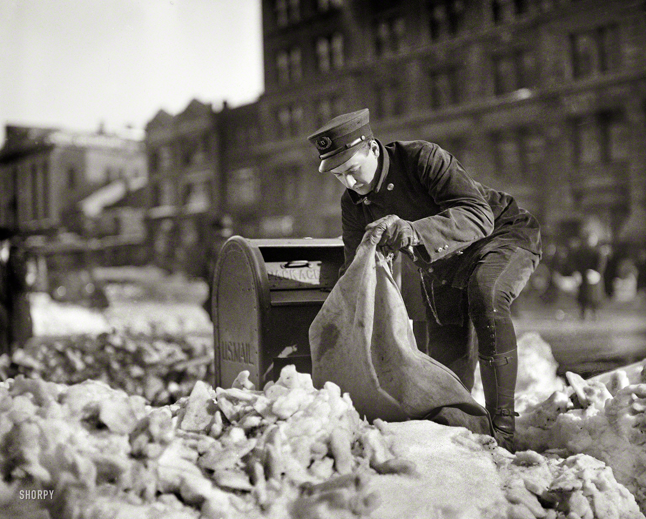 &nbsp; &nbsp; &nbsp; &nbsp; Neither snow nor rain nor heat nor gloom of night stays these couriers from the swift completion of their appointed rounds.
January 1922. Washington, D.C. "Snow scenes after blizzard." When the mailbox is also an icebox. Harris & Ewing Collection glass negative. View full size.