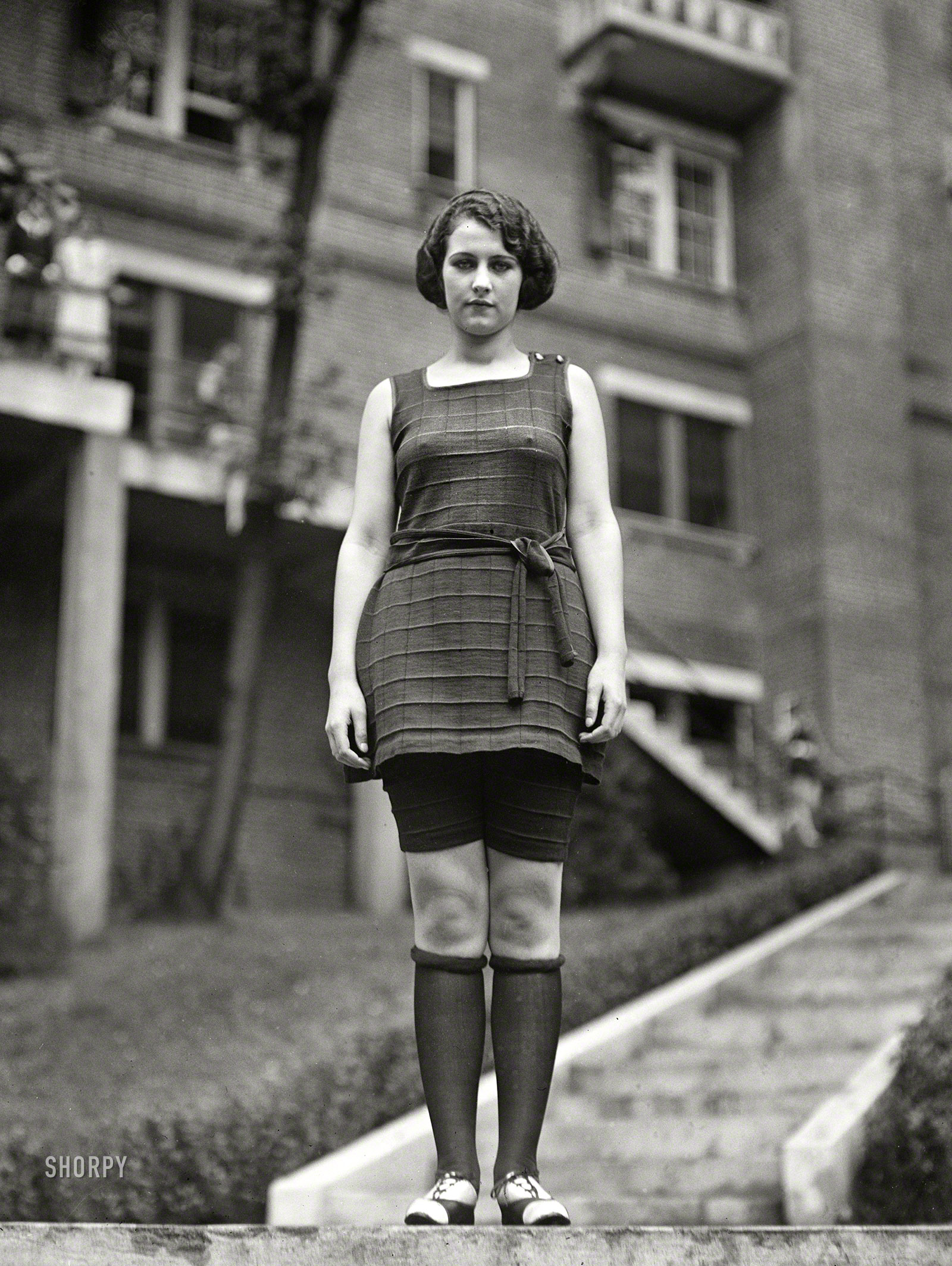 1922. "Miss Washington in bathing suit." Concealed yet revealed, Evelyn Lewis at the Wardman Park Hotel pool on a nippy day. Harris & Ewing. View full size.
