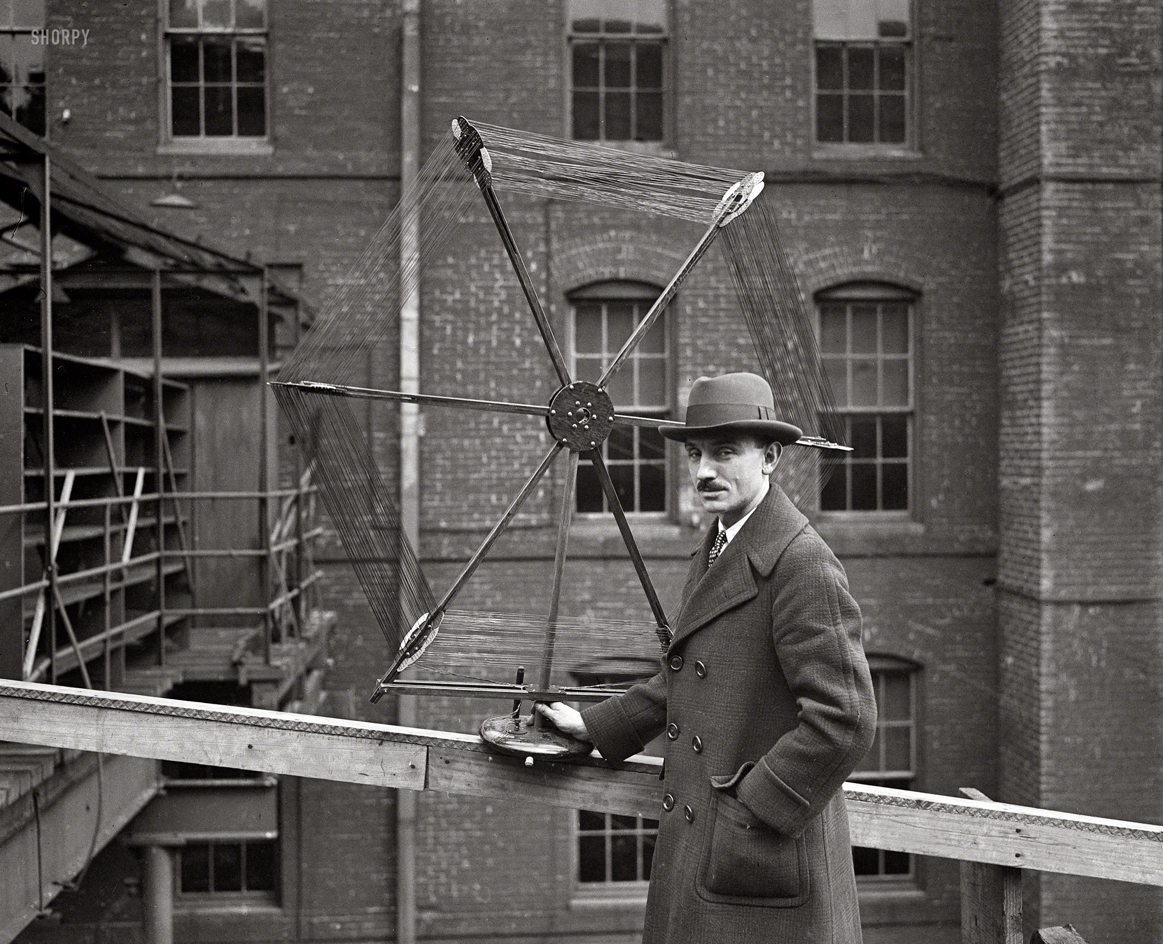 1924. Washington, D.C. "In recognition of his having conducted the most successful radio exhibition in the U.S., Alfred Stern, director of Washington's first radio exposition, was presented with this elaborate loop antenna by Dr. J. Harris Rogers, famous inventor. It is estimated that 50,000 persons attended this exhibition." Harris & Ewing glass negative. View full size.