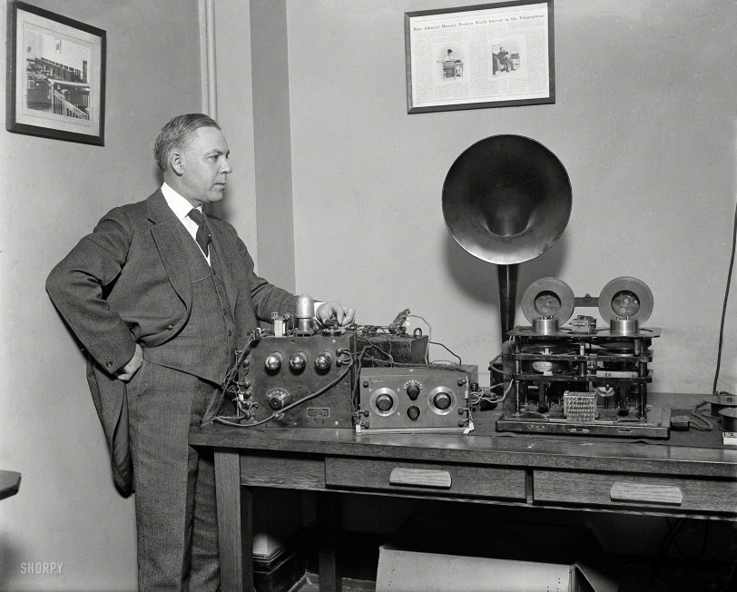 1924. "The latest in radio development which has been perfected by Mr. H.P. O'Reilly of Washington, D.C." Which seems to incorporate a "Telegraphone," the early wire recorder alluded to on the wall. Never miss another radio program again! Harris & Ewing Collection glass negative. View full size.