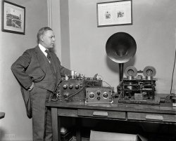 1924. "The latest in radio development which has been perfected by Mr. H.P. O'Reilly of Washington, D.C." Which seems to incorporate a "Telegraphone," the early wire recorder alluded to on the wall. Never miss another radio program again! Harris &amp; Ewing Collection glass negative. View full size.
Western Electric 7AThe amplifier on the left looks like a Western Electric 7A. It used three 216A tubes. Both the amp, and the tubes are fairly rare and valuable today.
[Click to enlarge. - Dave]

(Technology, The Gallery, D.C., Harris + Ewing)