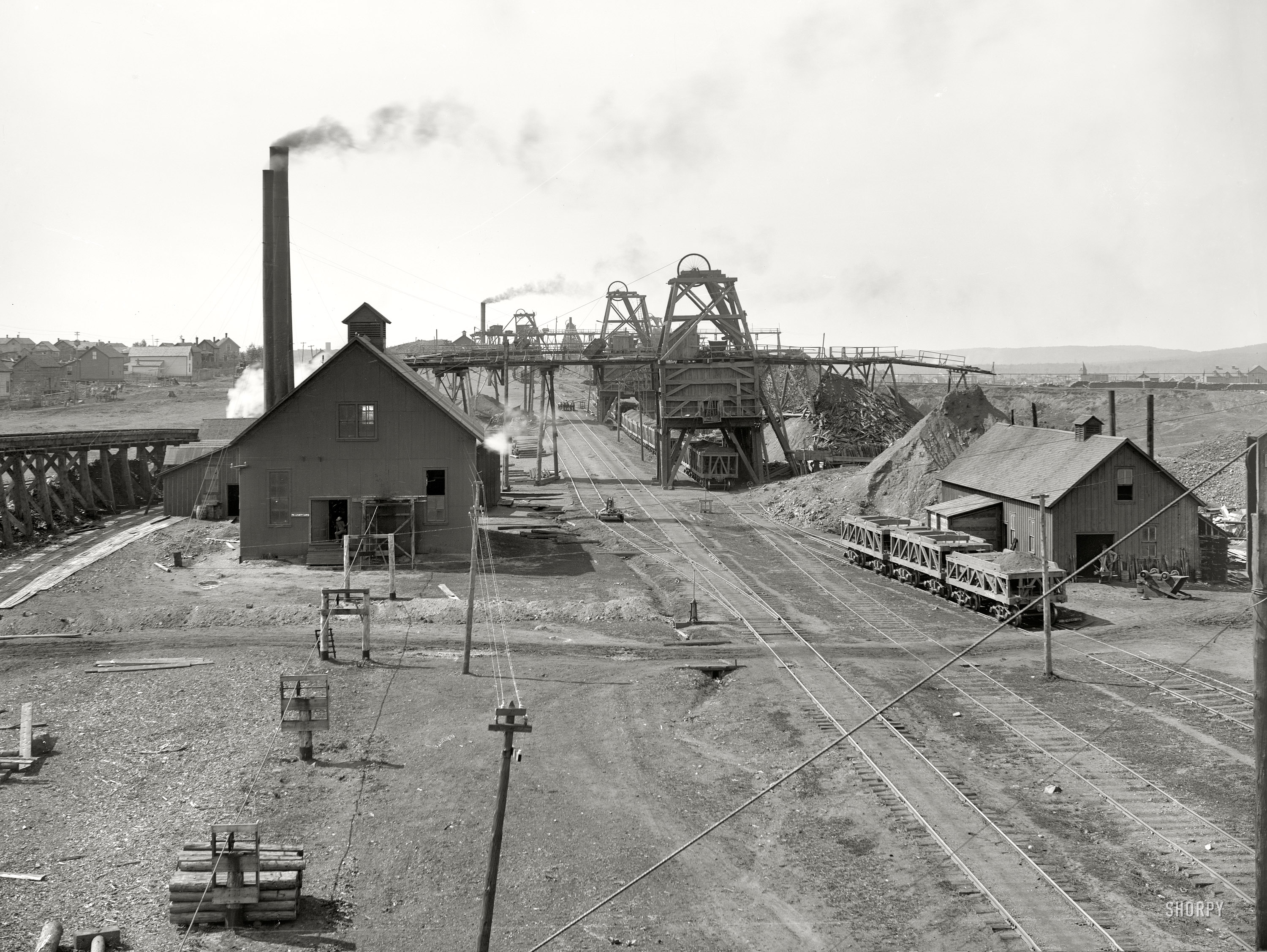 Iron mining circa 1899. "Norrie group No. 3, Ironwood, Michigan." 8x10 inch dry plate glass negative, Detroit Publishing Company. View full size.