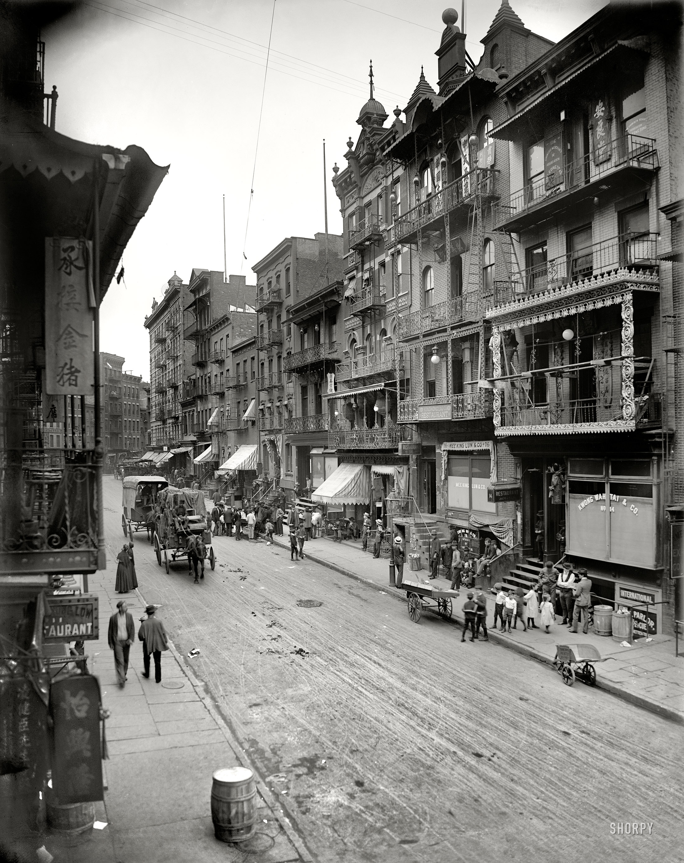 New York circa 1900. "Chinatown -- Mott Street." 8x10 inch dry plate glass negative, Detroit Publishing Company. View full size.