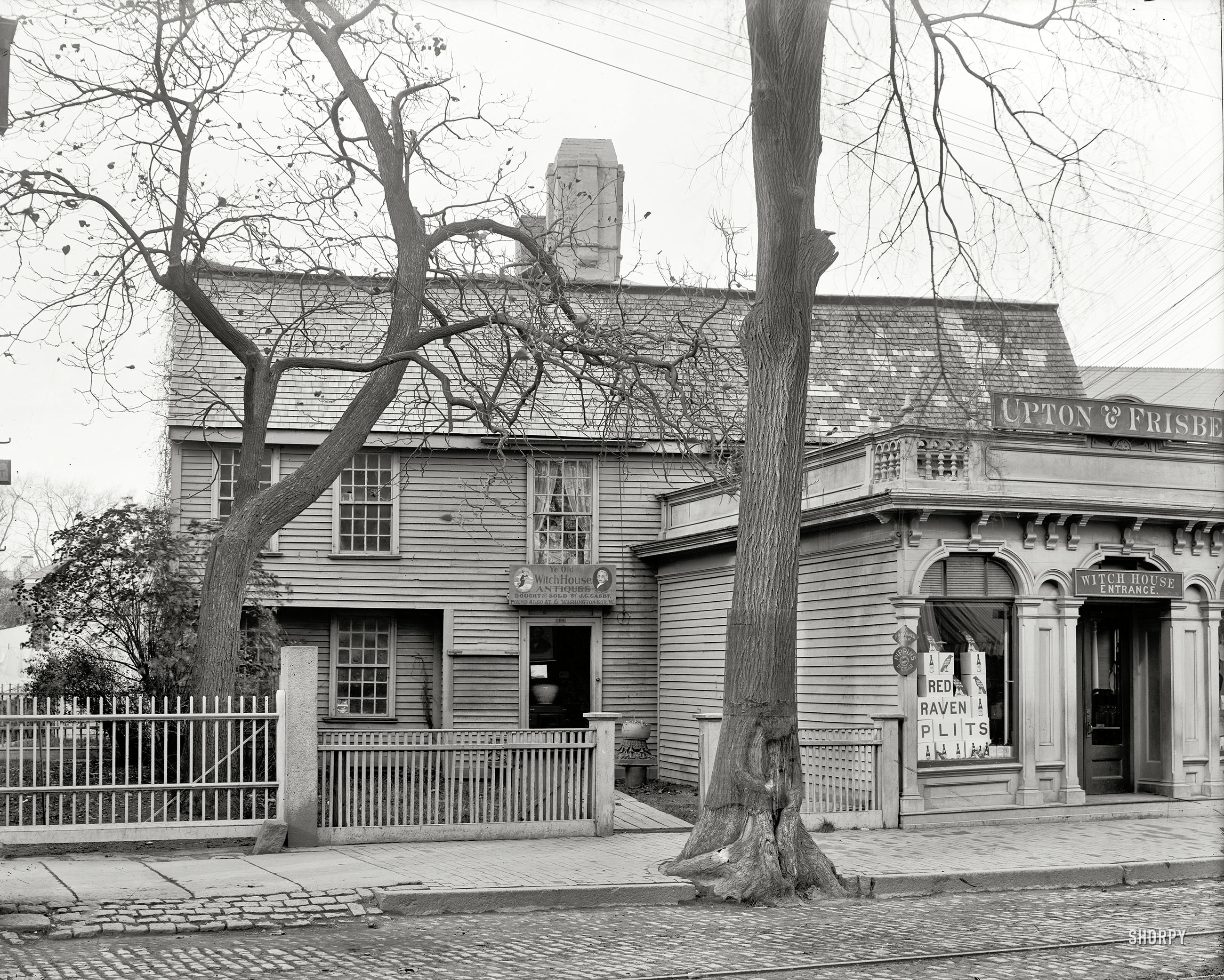 Salem, Massachusetts, circa 1901. "The Witch House." One-stop shopping for antiques, cigars and spirits of all kinds. 8x10 glass negative. View full size.