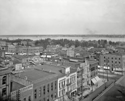 Port Huron, Michigan, circa 1900. "General view east from Post Office." The signs are everywhere in this bird's eye view of the business district. View full size.