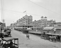 Circa 1901. "The Islesworth and Virginia Avenue, Atlantic City." Much interesting signage among the hotels, our favorite being the advertisement for photo developing and printing "in 12 hours." 8x10 glass negative. View full size.