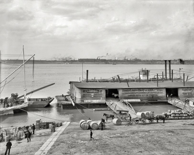 The Ohio River circa 1905. "The levee -- Louisville, Kentucky." This barge was last seen here; the large barrel-like containers are hogsheads of tobacco. At left, the bow of the sternwheeler Georgia Lee in a continuation of this view. 8x10 inch dry plate glass negative, Detroit Publishing Company. View full size.
