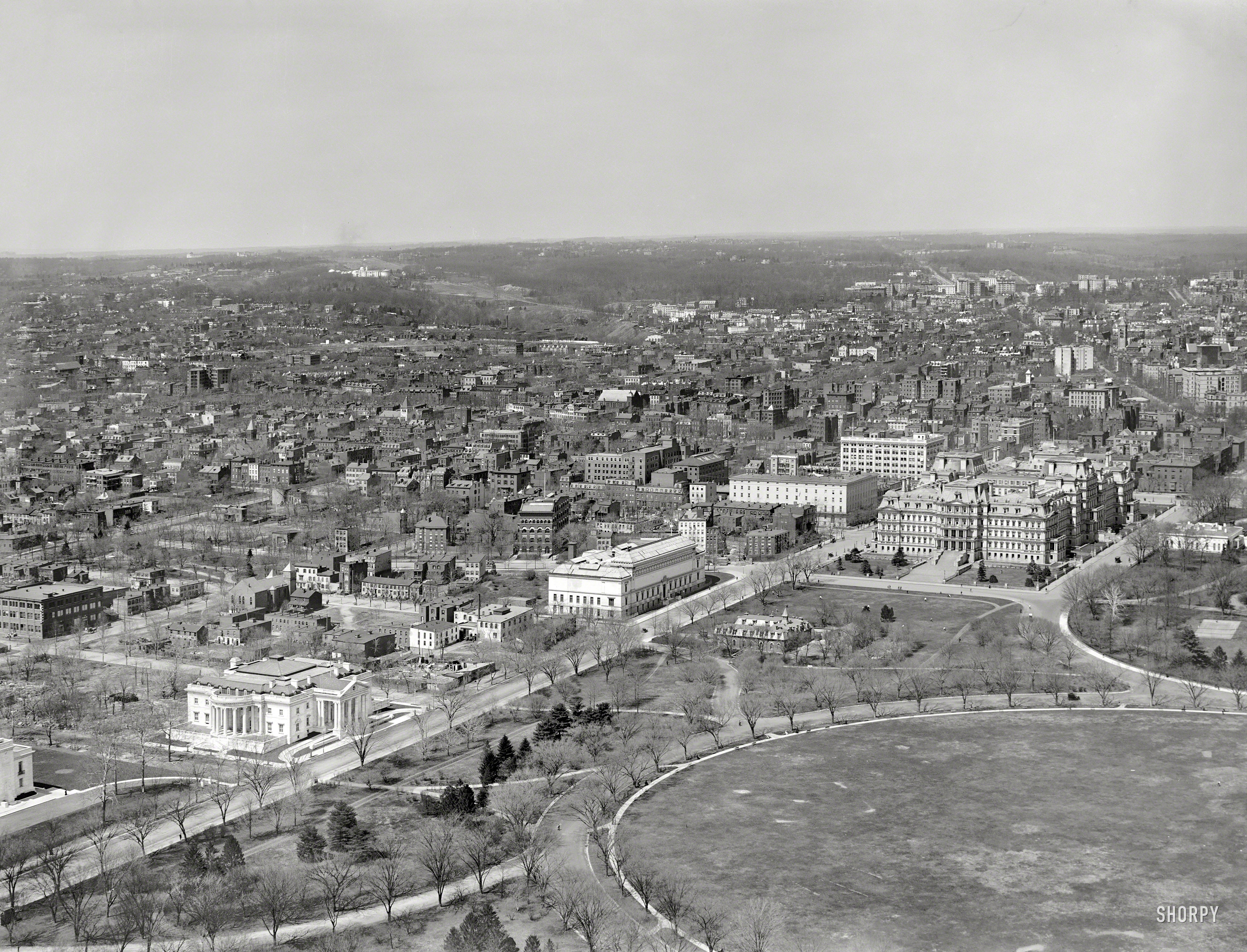 Circa 1911, our third selection from the panoramic series "Washington from Washington Monument." Landmarks include, from left, Memorial Continental Hall (headquarters of the Daughters of the American Revolution); the Corcoran Gallery of Art; State, War and Navy Building; and White House West Wingtip. 8x10 inch glass negative, Detroit Publishing Company. View full size.
