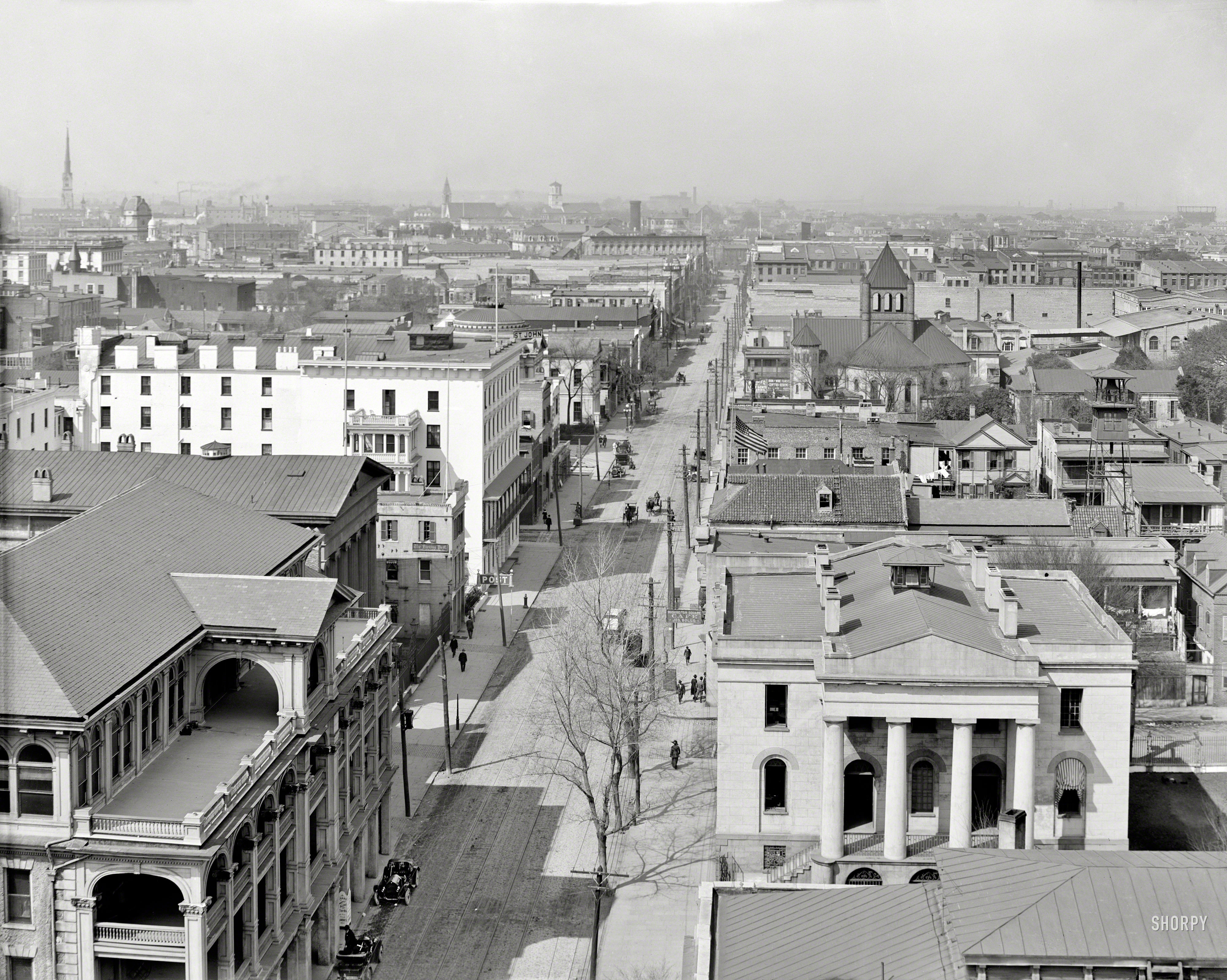 Charleston, South Carolina, circa 1911. "Meeting Street from St. Michael's Church." Our second installment of this multi-part panorama, with a nice view of the Fireproof Building and its Doric portico. 8x10 glass negative. View full size.