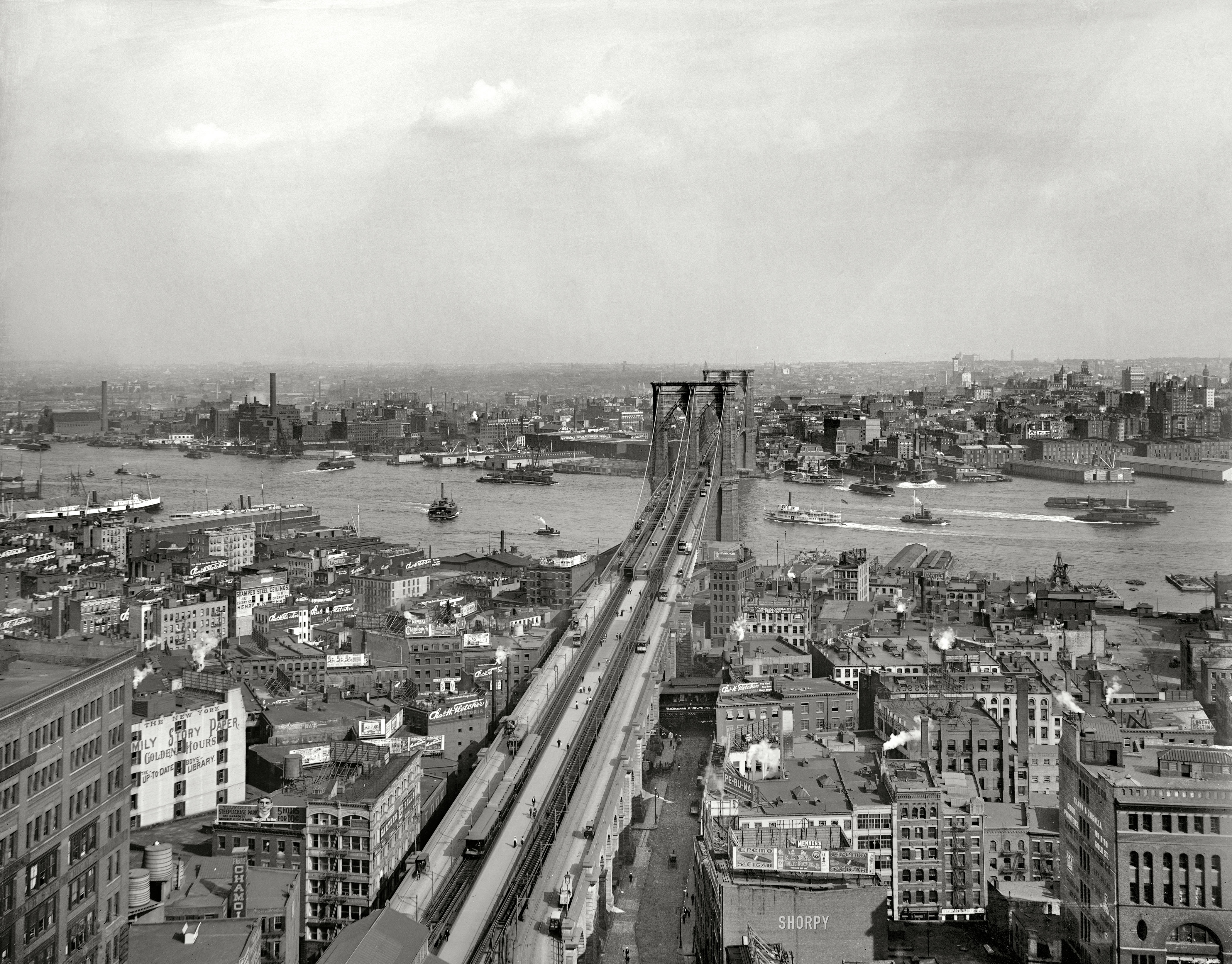 New York circa 1903. "East River and Brooklyn Bridge from Manhattan." Among the many signs competing for our attention are billboards for "Crani-Tonic Hair Food" and Moxie. 8x10 glass negative, Detroit Publishing Co. View full size.