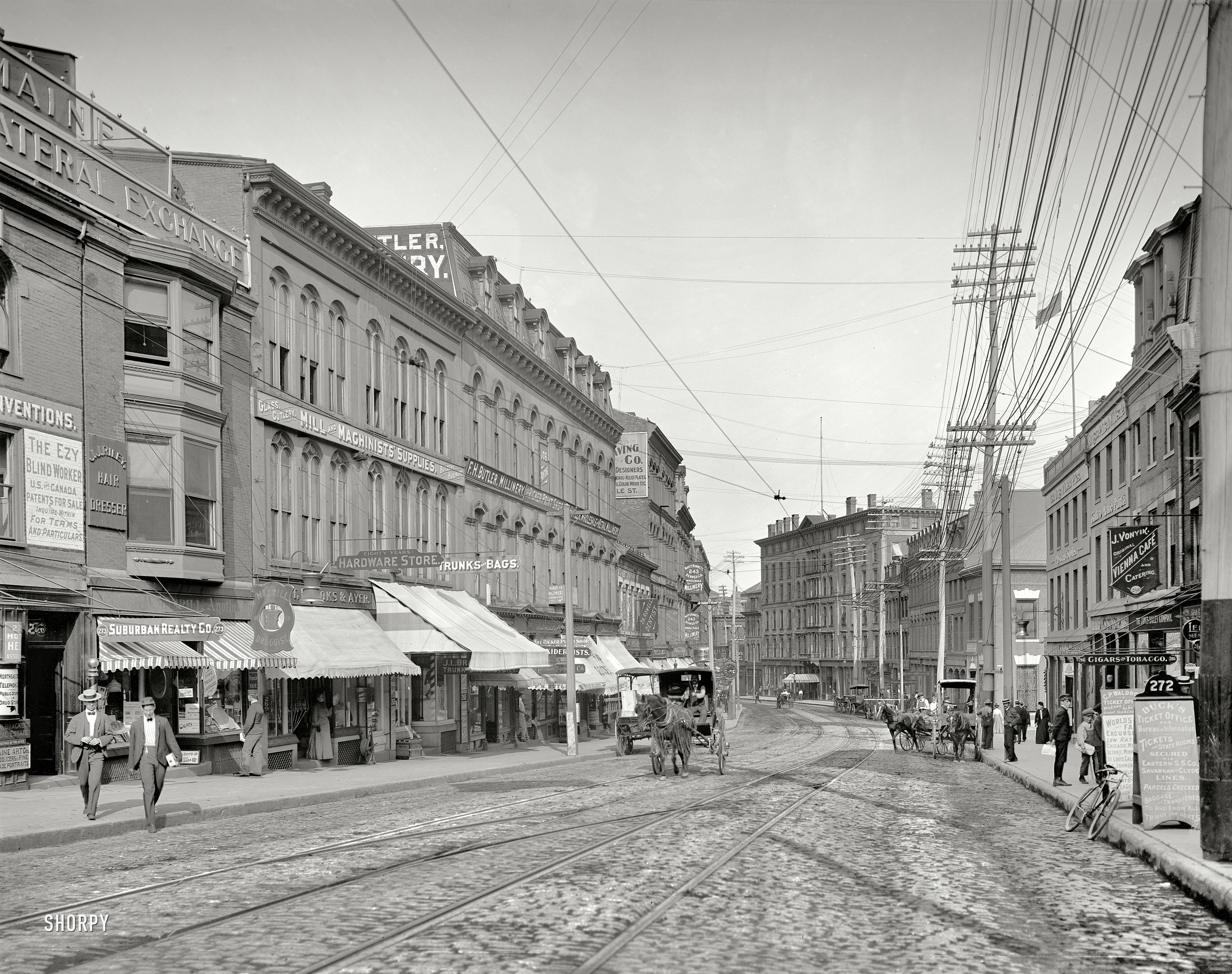 Portland, Maine, circa 1904. "Middle Street." Much signage for various goods and services including Taxidermy, Trunks & Bags and "The Ezy Blind Worker." Something to do with window shades, maybe, or a kind of libertine Helen Keller. 8x10 inch dry plate glass negative, Detroit Publishing Co. View full size.
