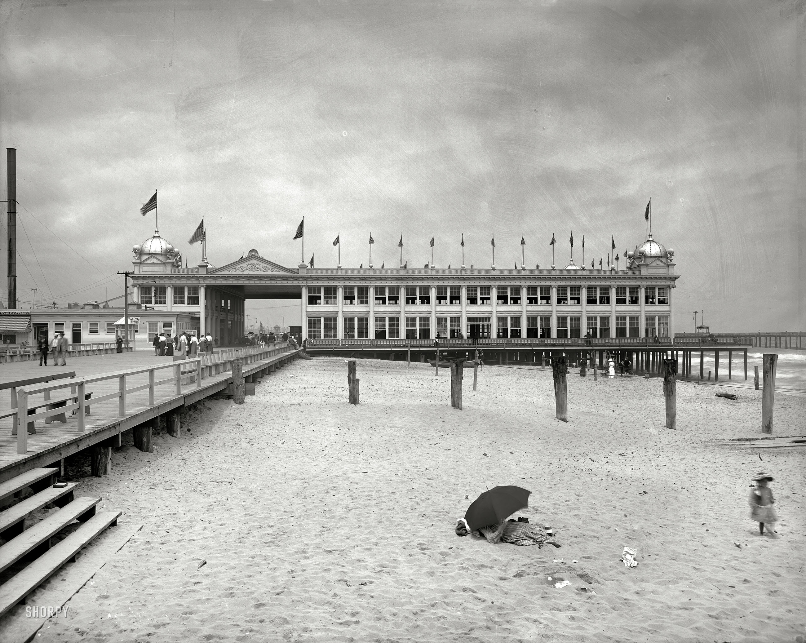 The Jersey Shore circa 1905. "The casino at Asbury Park." Prior to any attempts at sunning or swimming, please check in at the "Bathing Office." View full size.