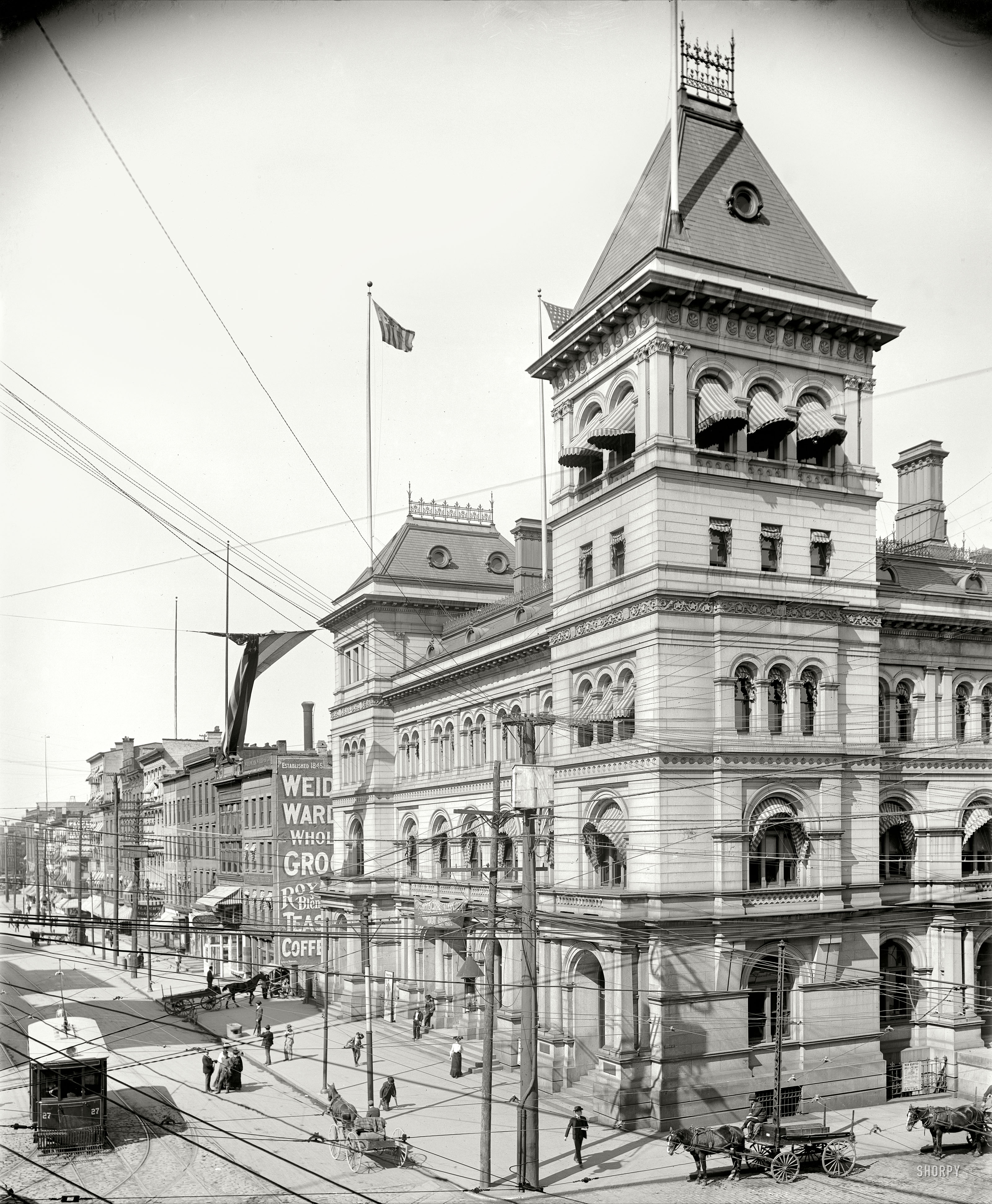 Circa 1906. "Post Office, Albany, New York," amid the usual cat's cradle of streetcar, telephone and telegraph wires. If the byword of 1960s America was "plastics," half a century earlier it was "copper." View full size.
