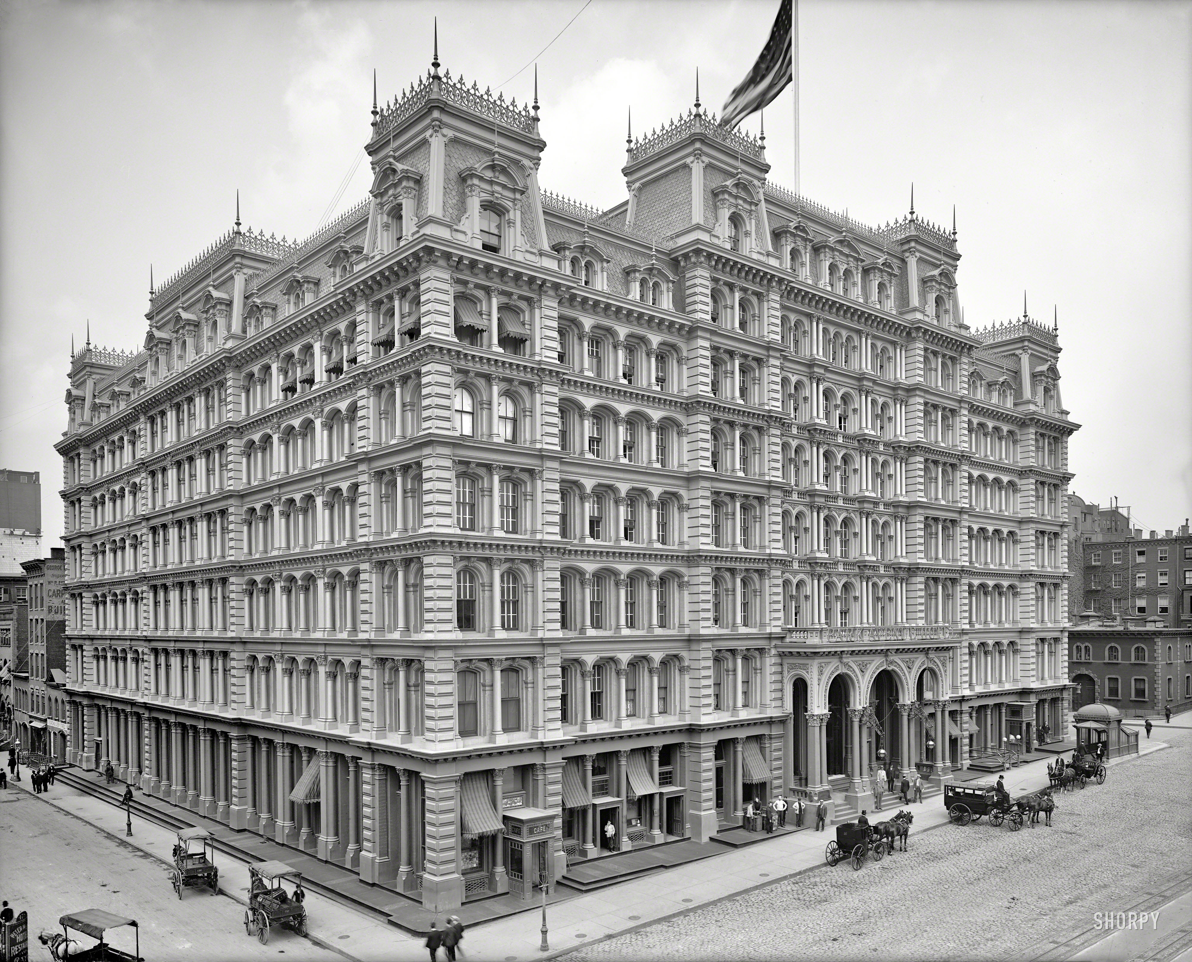 &nbsp; &nbsp; &nbsp; &nbsp; This Second Empire edifice opened in April 1878 as the Working-Women's Hotel, only to close eight weeks later due to an acute case of insolvency. Reopened as the Park Avenue Hotel, the cast-iron marvel at 34th Street lasted until 1924, when it was replaced by an office tower.
New York Circa 1905. "Park Avenue Hotel, Fourth Avenue entrance." 8x10 inch dry plate glass negative, Detroit Publishing Company. View full size.