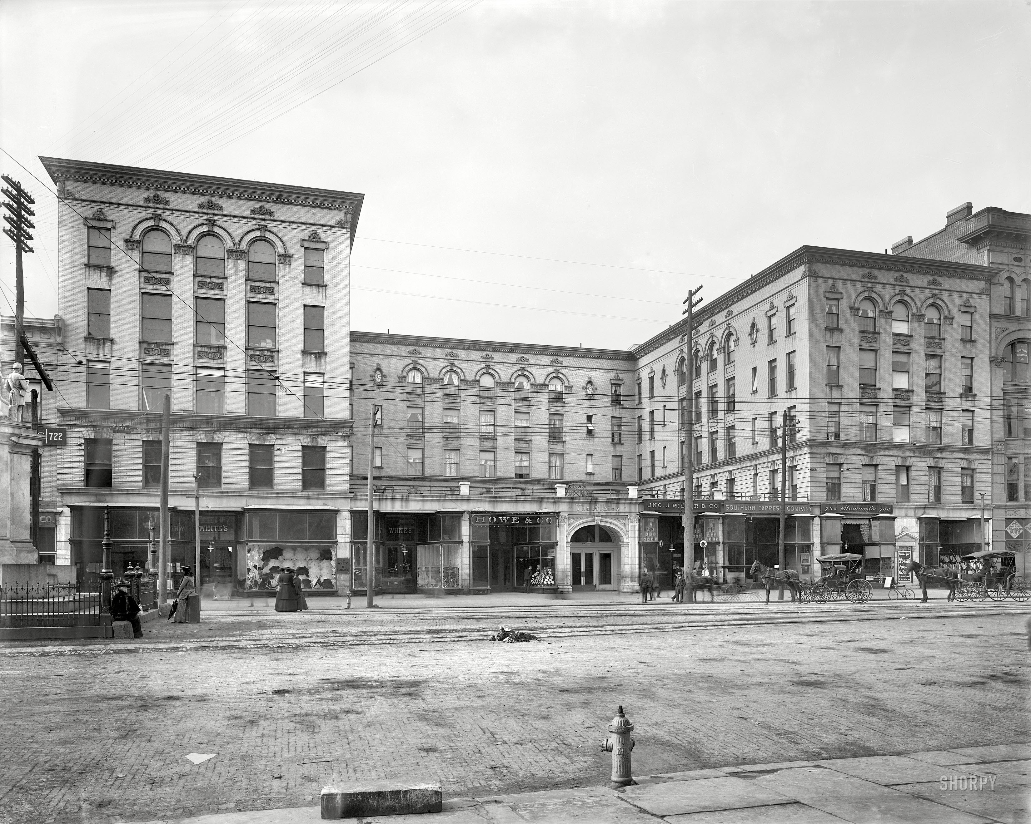 Augusta, Georgia, circa 1905. "The Albion." Please watch your step crossing the street. 8x10 inch glass negative, Detroit Publishing Company. View full size.