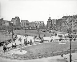 Circa 1905. "Mulberry Bend, New York City." The name was changed to Columbus Park in 1911. 8x10 glass negative, Detroit Publishing Co. View full size.
What if you were an UNpopular undertaker?Did that mean you had to take Chas. Bacigalupo's leftovers?
The Popular UndertakerPeople must be dying to meet him.
Baciagalupo storyHere's a short story on Chas. Baciagalupo's own funeral from the New York Times in 1908:
 "Charles Bacigalupo, who for thirty years has buried the rich and poor of Mulberry Bend and Chinatown, was himself buried yesterday, and no funeral of such a scale of grandeur has ever been offered to the reverent if color-loving and emotional people of that section. Bacigalupo died in Brooklyn in one of those comfortable, old-fashioned mansions in Second Place... There were more than 200 carriages and seemingly endless processions of Italian societies with banners draped in crepe and bands sonorously sounding dirges that kept the mourners' tears welling to their eyes.
"After the services at the house the coffin was brought to the hearse—not the famous automobile hearse, but the finest that was ever built to go behind horses. Then six jet black horses, draped in white netting that flowed over the pavement, started toward the Brooklyn Bridge with six attendants holding their bridles. Behind the hearse were nine open carriages piled high with the flowers that the dead undertaker's hundreds of friends had sent."
Mr. Bacigalupobelieved in the phrase it pays to advertise.  Apparently he also has his name &amp; addresses etched under a relief at the Most Precious Blood Church.  Here's a very good link that gives backround on "The Popular Undertaker".
The buildings to the left are all gone, now the Manhattan Detention Complex.  The building left of center with the large flagpole on the roof is still there (106 Bayard Street).
The Other HalfThis spot is the stuff of dark legends, as mythic a place as exists in New York. It once skirted the eastern edge of the Collect Pond, the fresh water supply of the Dutch and English settlements, and later marked the 12 and 2 positions of the Five Points, with the notorious alleys of Mulberry Bend, immortalized by Jacob Riis, burrowing inward from the street. The efforts of Riis and others brought about the demolition of the entire block between Mulberry and Baxter Streets. The park, designed by Calvert Vaux of Central Park fame, opened in 1897. The manicured ovals are long gone, replaced by basketball courts and playgrounds, but the pavilion remains, nicely restored in 2004. As the signage in the photo indicates, this was part of Little Italy 108 years ago, but is now firmly within Chinatown.
It&#039;s Chinatown JakeThe parkhouse still stands. The foreground is now mostly basketball courts.
The street on the left is Baxter Street. The buildings on the left, on the other side of Baxter, were replaced by the NY County District Attorney's office (1 Hogan Place) and NYC Criminal Court.
The street on the right is Mulberry Street. Yup, THAT Mulberry Street. The buildings on the right, on the other side of Mulberrry, are in Chinatown. The buildings in the farground, beyond the parkhouse, are in Little Italy. Little Italy has steadily been shrinking as it is subsumed by the expanding Chinatown.
Very close by was the infamous Five Points neighborhood and Collect Pond. Very much a "Gangs of New York" area in the 1800's. The pond was filled in after it became too polluted. The famous NY County Supreme Court (60 Centre Street -- where Chris Kringle had his trial in Miracle on 34th Street) would one day be close by on the left. To this day it has pumps in the basement working 24/7 to keep the water that used to flow into the pond from flooding the basement. So do several other buildings around the old pond site.
Five PointsAnd a shot of the notorious Five Points neighborhood, probably the toughest worst neighborhood in America ever, at least in the 19th century.  At this point we are around the time of the Five Points Gang war with the Eastman Gang. Johnny Torrio and Al Capone were getting their start with Five Pointers at the time of this picture.
Not a school dayI have never seen so many children in a Shorpy photo before. Looks like this park is where they congregate. Has to be better than a tenement. From what I can tell 99% are unsupervised by an adult. Different times: when even small children improvised their own games and entertainment.
Keep them assets earnin&#039;Mr. Bacigalupo will rent you his coaches any time, day or night... so long as they don't contain one of his "customers". Apparently a common practice... several years earlier, the couple responsible for the 1897 NYC "murder of the century" hauled away the decedent by hiring a wagon from their neighborhood undertaker. A touch of irony, in that case.
RegardlessEven if your comment isn't posted, others might still answer your questions.  Glad to see that the pavilion is still there.  Shame the park is now converted into so many basketball courts [nothing against basketball, you understand], but it would be nice to have the greenery.
SnoozingI notice several gents having a nap while sitting on the benches.  When I was younger, I couldn't understand how you could sleep sitting up like that.  Now I wonder how you don't. Embarrassing in restaurants.  Ahem.
All in Chinatown NowThe buildings right behind the park pavilion are all in Chinatown now, and have been since at least when I lived in the area in the 60s and 70s. There were only a handful of longtime Italian businesses and families I knew left there on Bayard and Mulberry Streets. The tourist trap of restaurant after restaurant that is Little Italy now doesn't begin until north of Canal Street, running up Mulberry Street for about a half mile or so.
By the way, the building with the flagpole and flag to the right of center is 70 Mulberry Street, formerly Public School 23, and now the Research Center location of MoCA, Museum of Chinese in America.
(The Gallery, DPC, NYC)