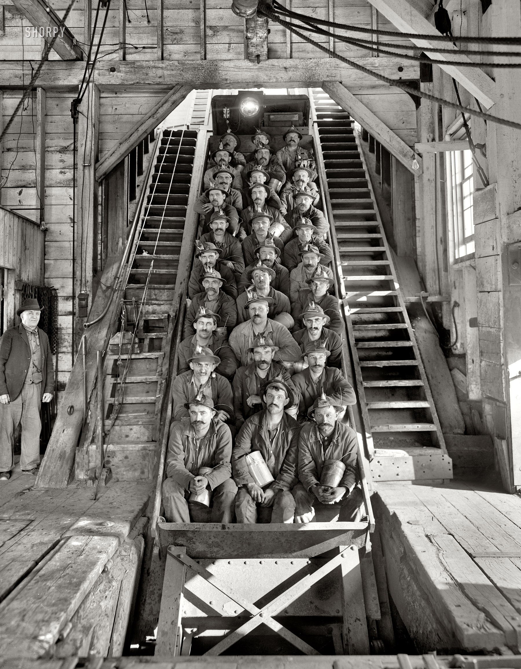 Calumet, Michigan, circa 1905. "Just up, Hecla Shaft No. 2." Copper miners topside. 8x10 inch dry glass negative, Detroit Publishing Co. View full size.