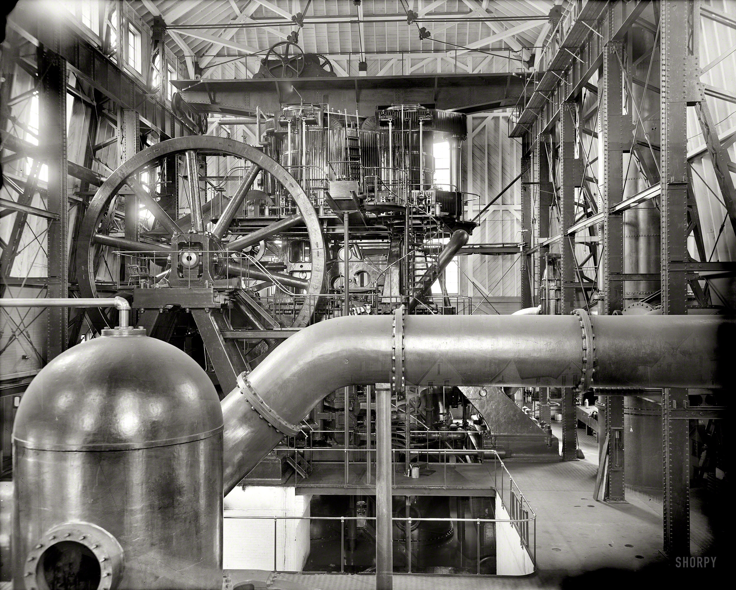 Copper production circa 1906. "12,000 horsepower compound pump, Calumet and Hecla stamp mill, Lake Linden, Michigan." Note the faint double exposure in this 8x10 inch glass plate. Detroit Publishing Company. View full size.