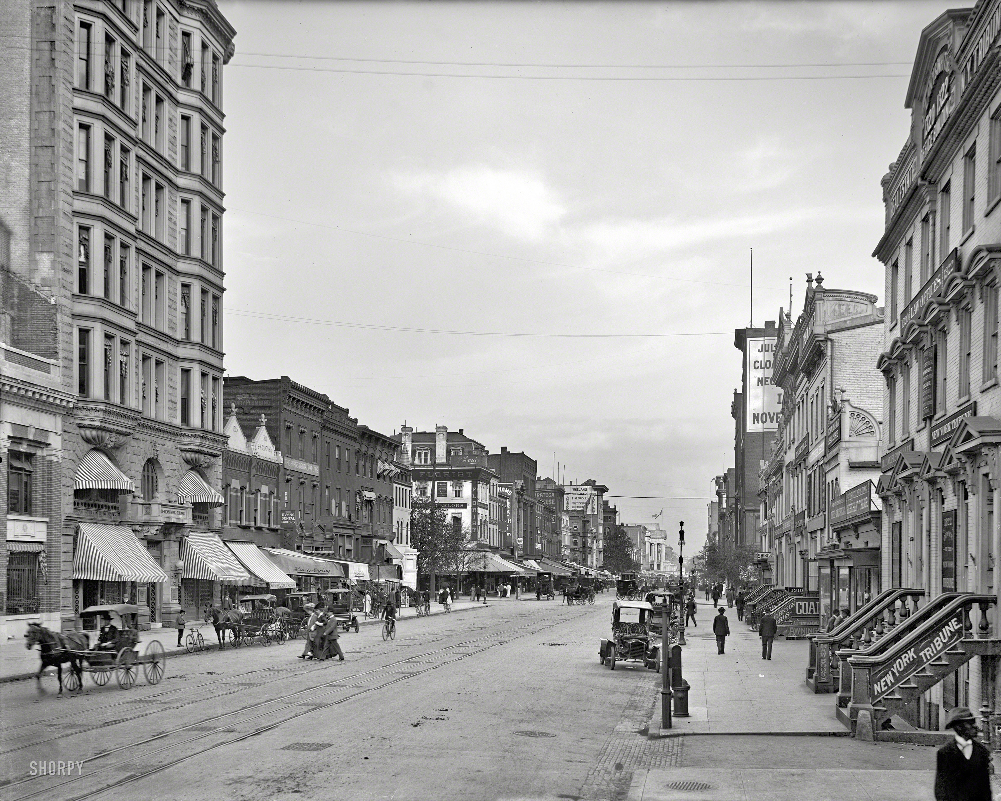 F Street Northwest in Washington, D.C., circa 1906. Note the Harris & Ewing photographic studio, source of many of our images here on Shorpy, at left. 8x10 inch dry plate glass negative, Detroit Publishing Company. View full size.