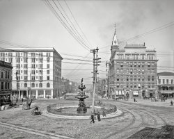 Montgomery, Alabama, circa 1906. "Commerce Street from Court Square." Whose designer would probably be none too pleased with the telephone poles and wires sprouting from his fountain. Our second look at this bustling hub. 8x10 inch dry plate glass negative, Detroit Publishing Company. View full size.