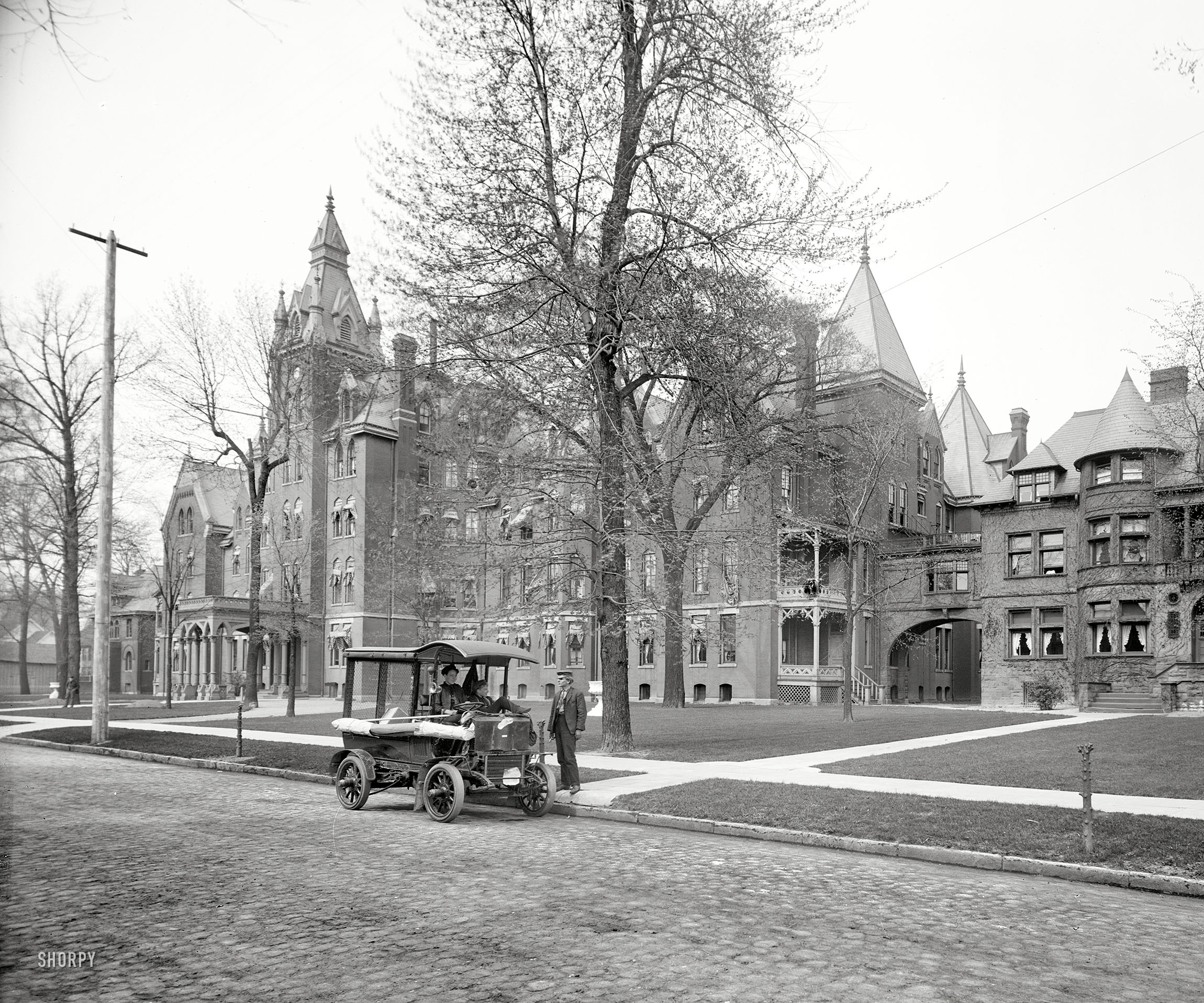 Detroit circa 1906. "Harper Hospital." And a dubious-looking conveyance we trust isn't the ambulance. Detroit Publishing glass negative. View full size.