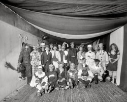 Aboard the U.S.S. Maine in 1896. "A fancy dress ball." Our second look at these seafaring thespians aboard the ill-fated battleship. 8x10 inch dry plate glass negative by Edward Hart, Detroit Publishing Company. View full size.