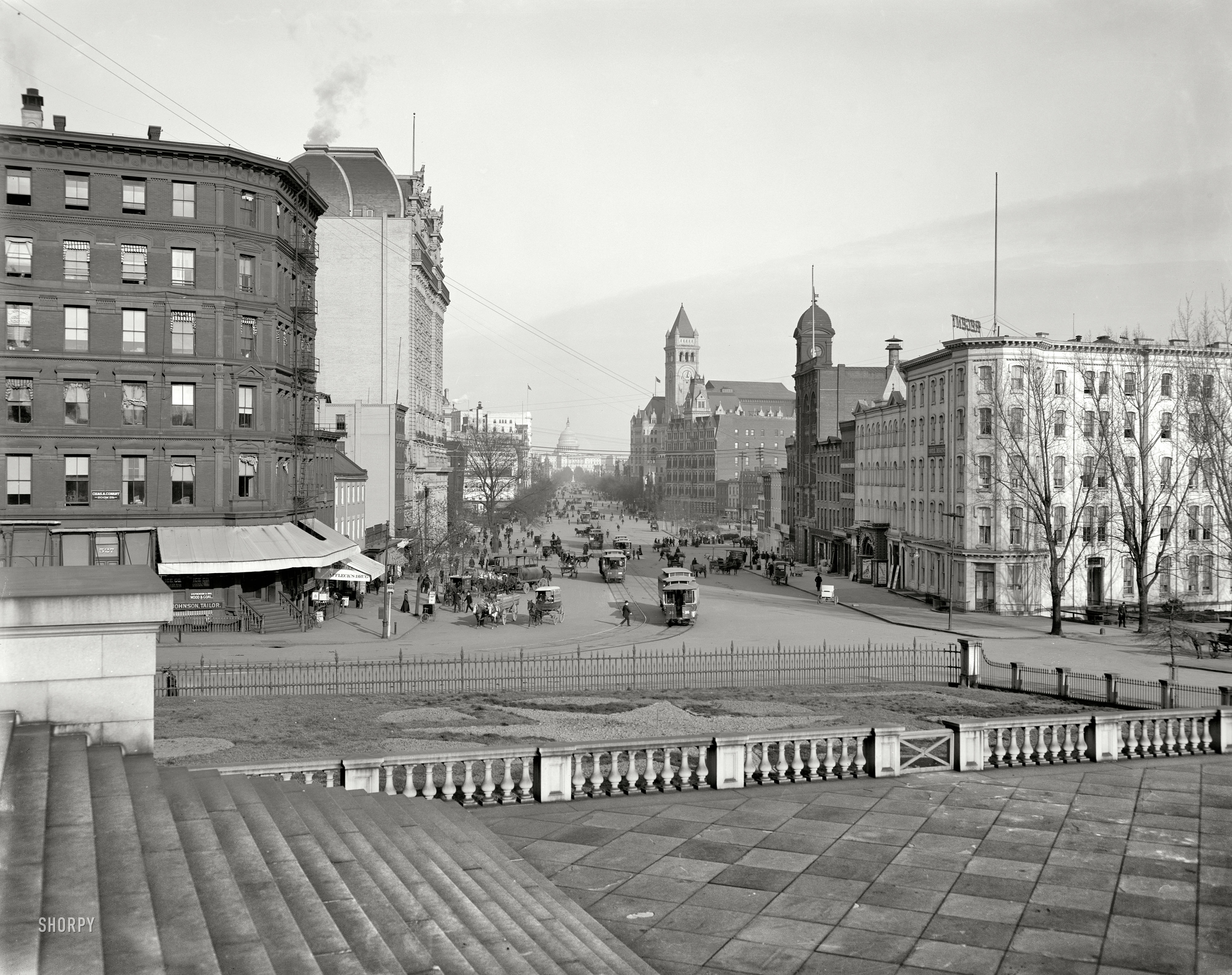 "Pennsylvania Avenue, Washington, 1902." Landmarks in this view from the Treasury steps at 15th Street include the Capitol and Old Post Office. On the bill at Chase's Polite Vaudeville: Capt. Woodward's trained seals. 8x10 inch glass negative by William Henry Jackson, Detroit Publishing Co. View full size.