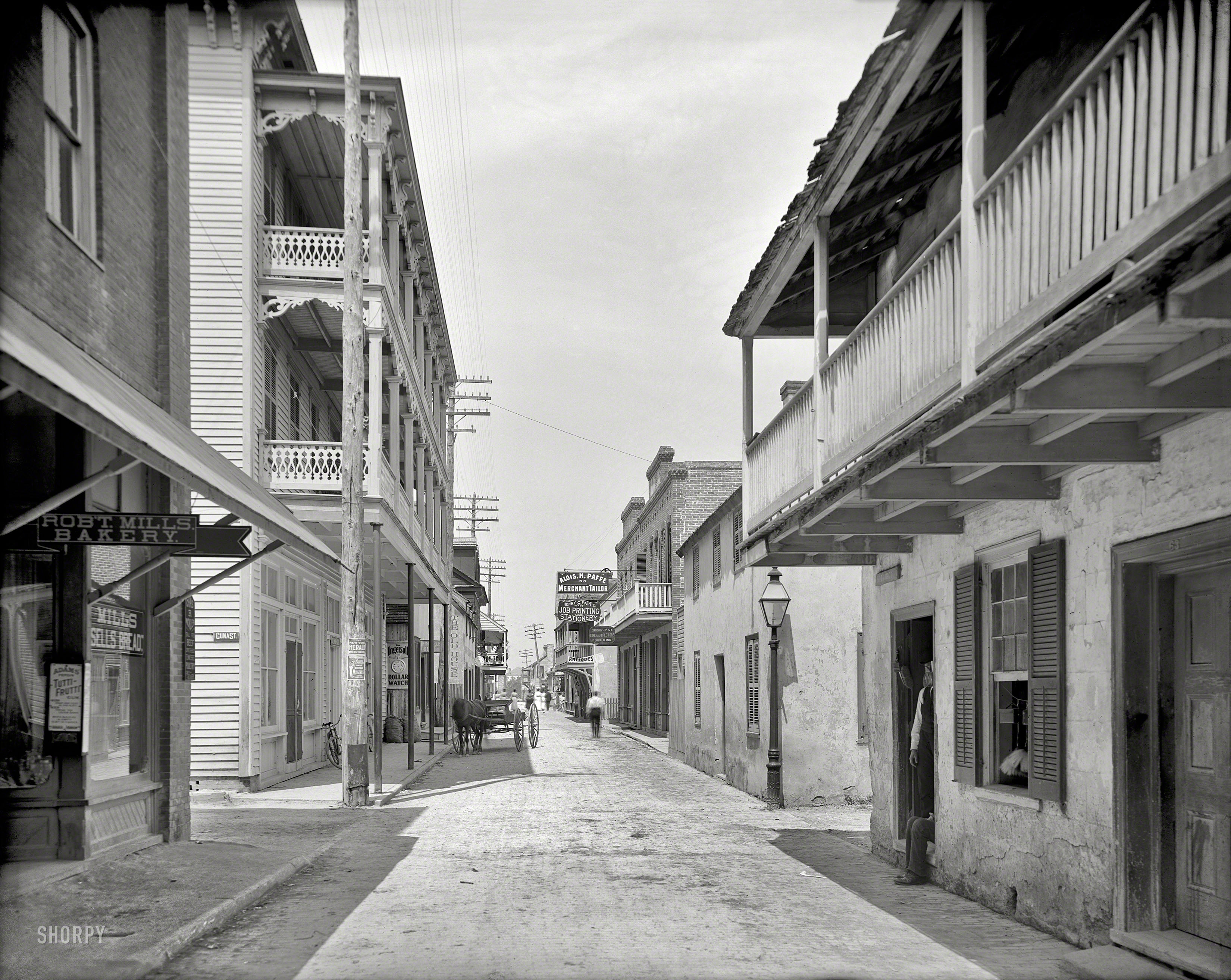 Florida circa 1910. "St. George Street, St. Augustine." Where merchants include purveyors of the "Ingersoll Dollar Watch." 8x10 glass negative. View full size.