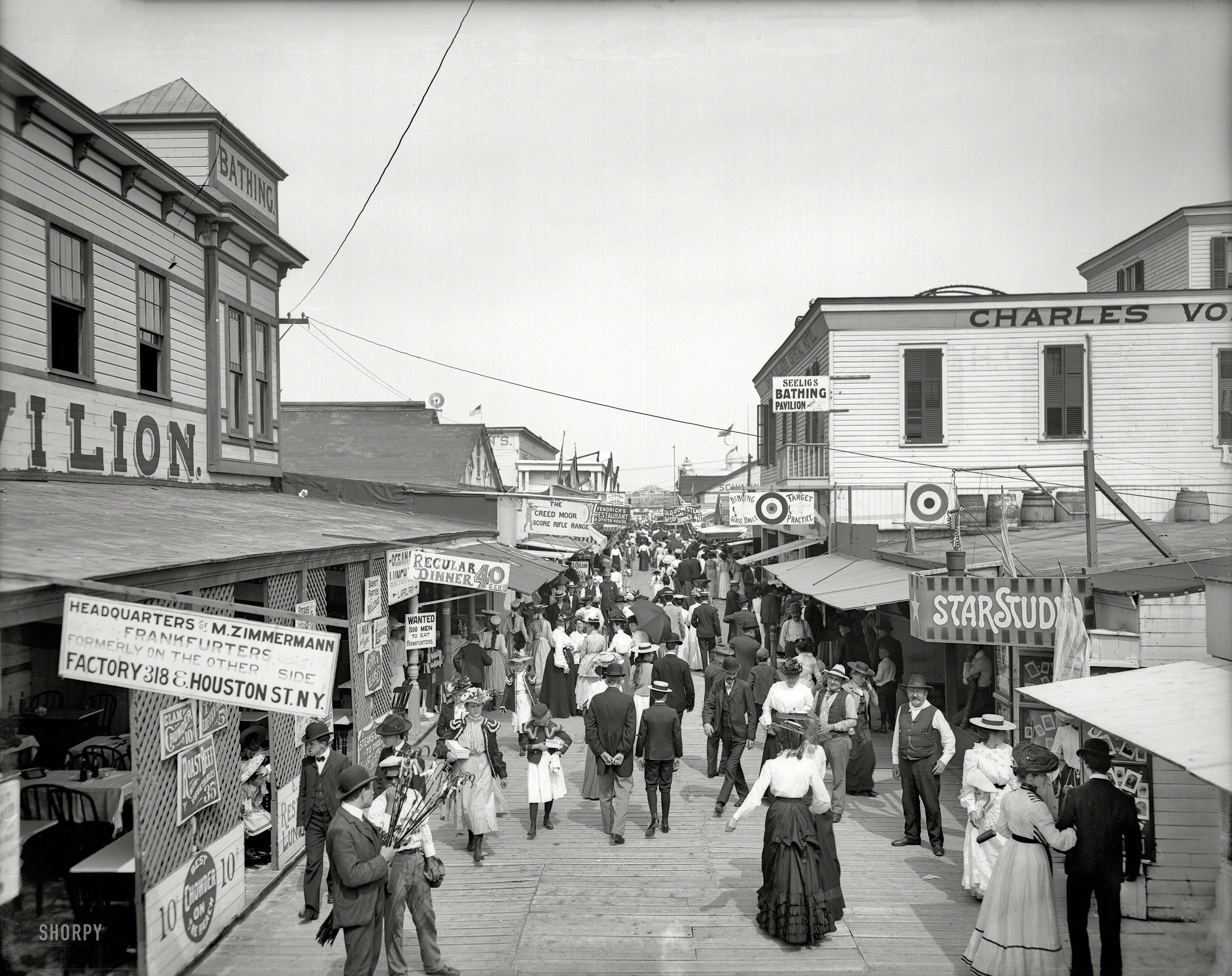 Rockaway, New York, circa 1905. "The Bowery looking east." Much intriguing signage here. 8x10 inch glass negative, Detroit Publishing Co. View full size.