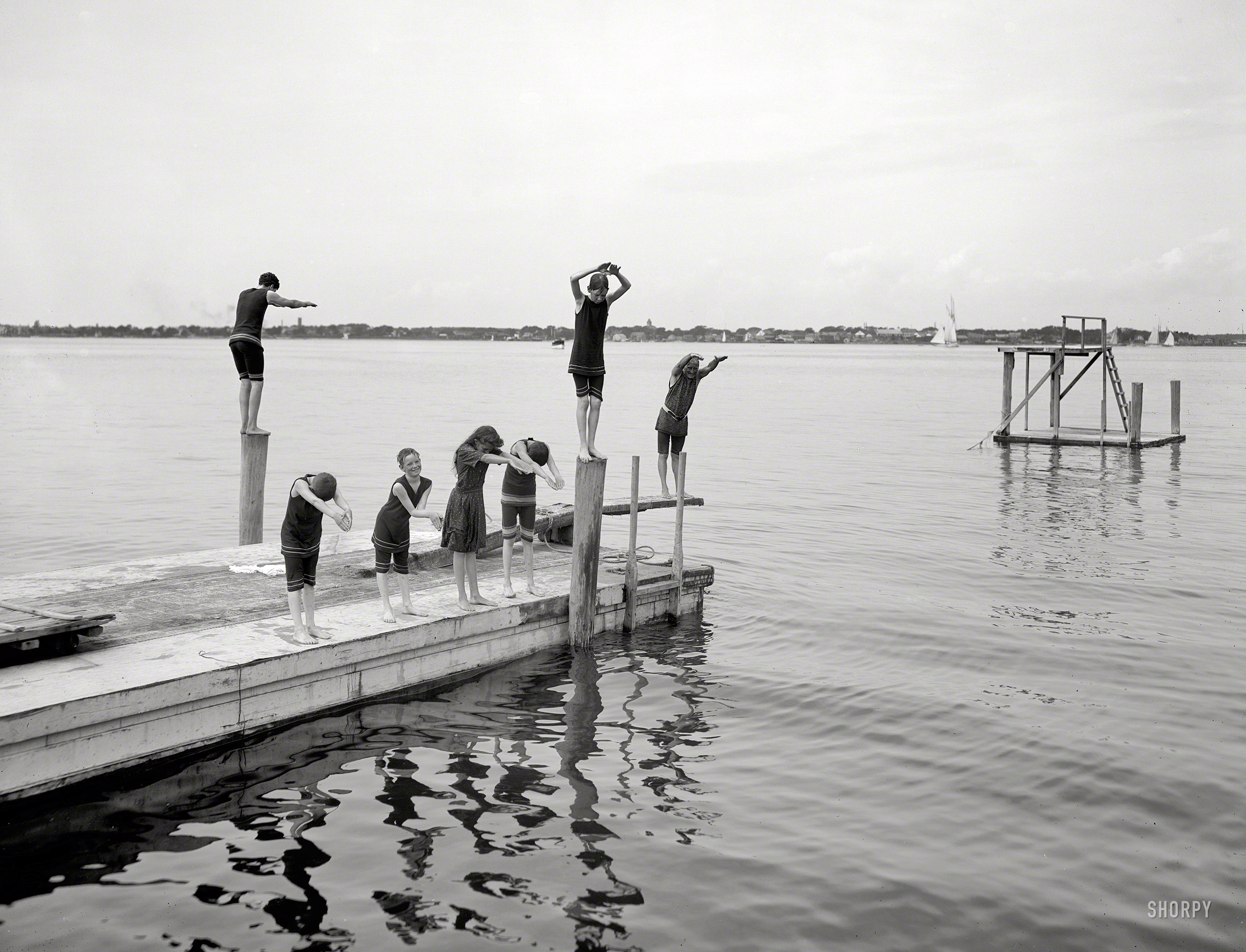 New York circa 1904. "Manhanset Manor. Bathing at Manhanset House, Shelter Island." Poised boys and a girl. 8x10 inch glass negative. View full size.
