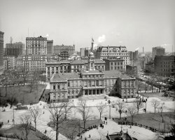New York circa 1903. "City Hall." Note the building going up at left and construction at right. 8x10 glass negative, Detroit Publishing Co. View full size.
299 Broadway?That appears to be the building going up on the left at Duane Street.  Known as the Ungar Building, it has 18 stories and was completed in 1905.
There are those newsies againPreviously seen at Shorpy, two statues of newsboys on the building behind City Hall.
Changing viewsThe view would change dramatically in just a few years, with the construction of the 40-story Municipal Building on the right side of this picture.
TweedAnd behind City Hall is the "New County Court House." (Official name)
Better known as the Tweed Court House, now the home of the Board of Education.
It is the only building named after a rouge, Boss Tweed, and while it was a knick name - it became that when it was re-dedicated as The Tweed Court House!  It's even written in stone on the re dedicated corner stone.  
For laughs once I asked 2 NYPD officers standing on the steps if they knew where the "New County Court House is"  and they shrugged and pointed me up Centre Street.
The North side of City Hall is made of cheaper brownstone painted white while the rest of the building is marble.  When built, the city fathers thought the city would never grow north, and saved the tax payers money on the backside of the building that would face away from town.
Next uptown on the left of frame is the building housing the NY Sun Newspaper.  To the right of that, standing two stories taller is the Emigrant Savings Bank.  Both still standing.
The fountain in the foreground ran on Croton water, and flowed freely without a pump from the gravity feed from the reservoir.  (All water in NYC will go 6 stories high by natural pressure.)
180 degrees from this view would have been the main post office - an eyesore from the day it was new.
A year later?The kiosks and skylights for the 1904 Interborough Rapid Transit Subway are complete and not barricaded, could this photo be a bit younger?
Neither brownstone nor marble these daysAleHouseMug is correct in stating that the north side of City Hall was, for nearly 150 years, brownstone painted white to match the marble on the other three sides.
(City Hall was at the city's extreme north when it was first built, so they used the cheaper material on the north side on grounds that few people would ever see it. Ha!)
But both the marble and the brownstone deteriorated so much that they were both replaced with limestone during a major renovation in the mid-1950s.
(The Gallery, NYC)