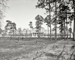 Aiken, South Carolina, circa 1905. "Park in the Pines Hotel." Of the resort's eponymous evergreens, it was claimed that "the exhalations from this tree exert a soothing and purifying effect upon the mucous membrane of the respiratory passages." At least until the place burned down in 1913. View full size.
Winter heatAccording to the New York Times "Winter vacationing New Yorkers ran for their lives", leaving valuables in the rooms when the fire broke out on Feb 2nd 1913. The only part of the hotel that survived was the dining room wing.
(The Gallery, DPC)